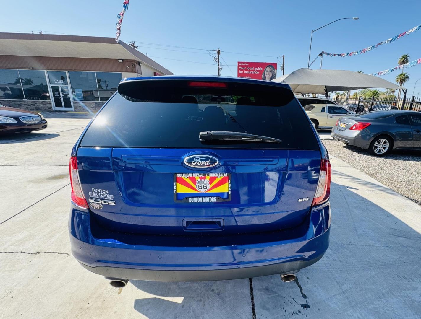 2013 dark blue metallic Ford Edge SEL FWD (2FMDK3JC2DB) with an 3.5L V6 DOHC 24V engine, 6-Speed Automatic transmission, located at 2190 Hwy 95, Bullhead City, AZ, 86442, (928) 704-0060, 0.000000, 0.000000 - Photo#3