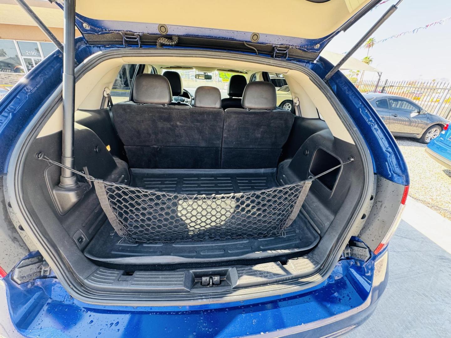 2013 dark blue metallic Ford Edge SEL FWD (2FMDK3JC2DB) with an 3.5L V6 DOHC 24V engine, 6-Speed Automatic transmission, located at 2190 Hwy 95, Bullhead City, AZ, 86442, (928) 704-0060, 0.000000, 0.000000 - Photo#5
