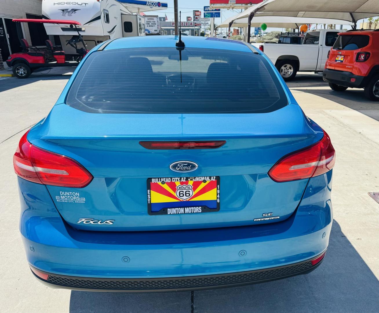 2015 blue Ford Focus SE , located at 2190 Hwy 95, Bullhead City, AZ, 86442, (928) 704-0060, 0.000000, 0.000000 - 2015 Ford Focus SE. only 74k miles. Brand new tires. completely serviced. Free warranty, Free carfax. IN house financing available. bluetooth, backup camera, ice cold AC. - Photo#2