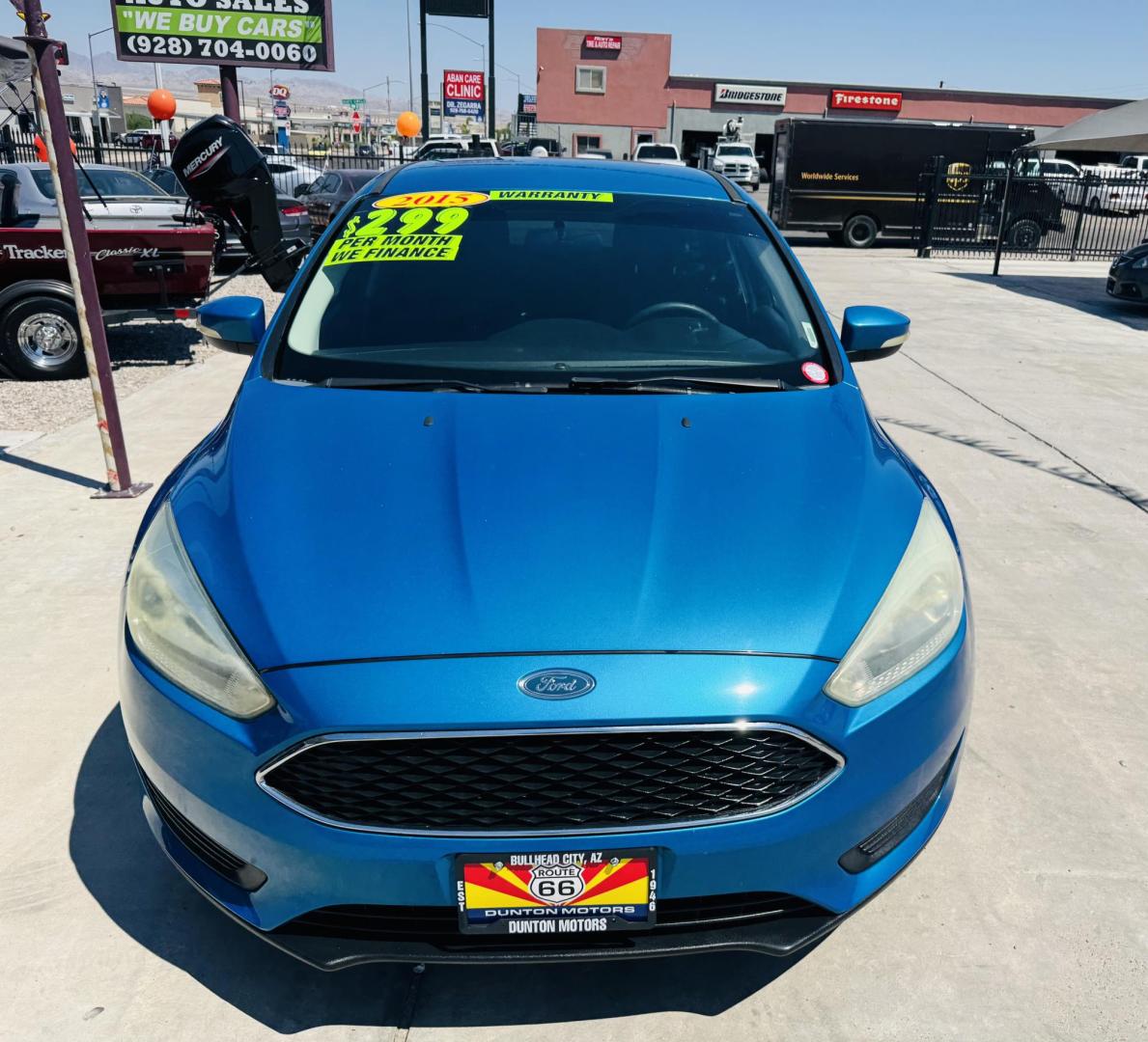 2015 blue Ford Focus SE , located at 2190 Hwy 95, Bullhead City, AZ, 86442, (928) 704-0060, 0.000000, 0.000000 - 2015 Ford Focus SE. only 74k miles. Brand new tires. completely serviced. Free warranty, Free carfax. IN house financing available. bluetooth, backup camera, ice cold AC. - Photo#1