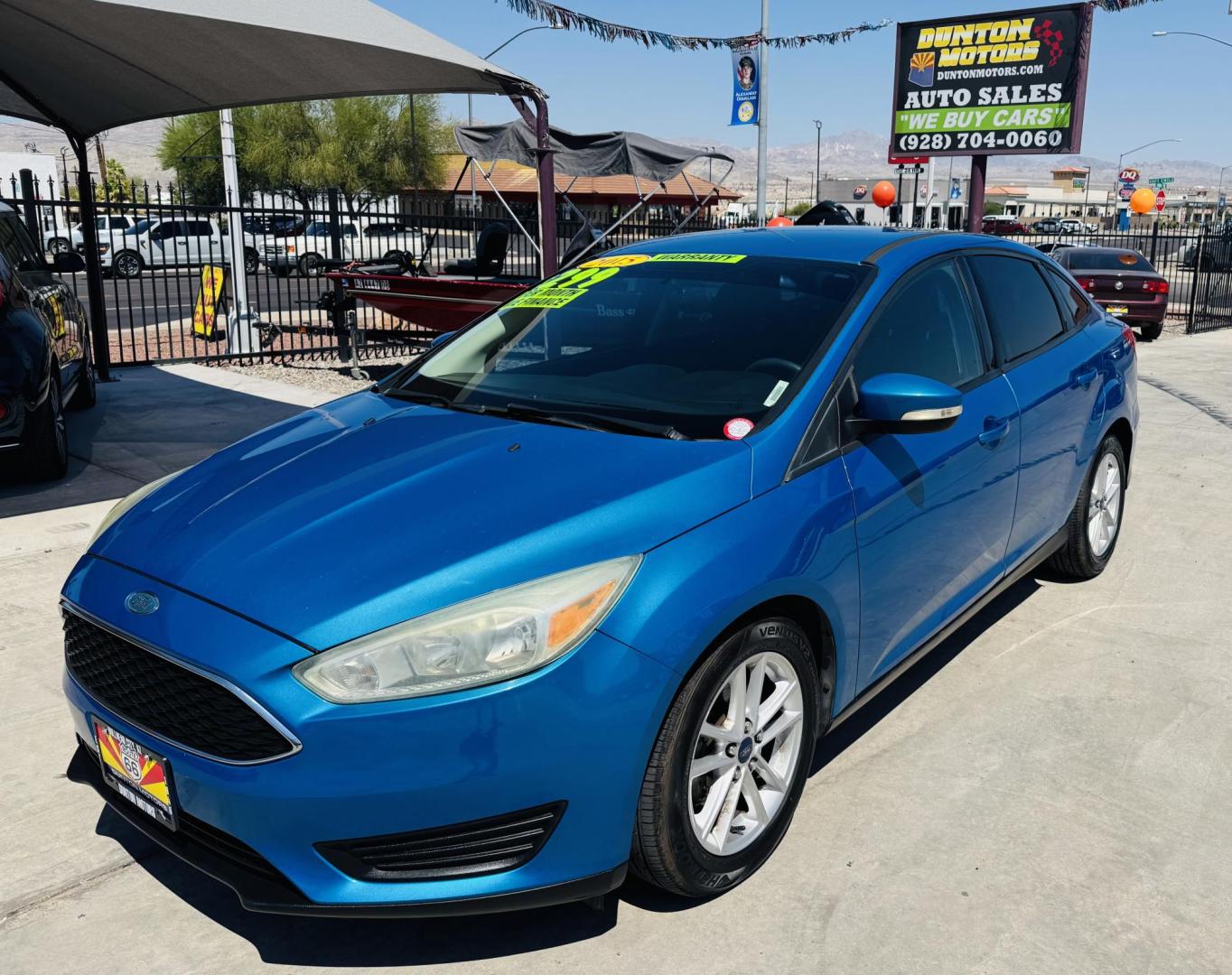 2015 blue Ford Focus SE , located at 2190 Hwy 95, Bullhead City, AZ, 86442, (928) 704-0060, 0.000000, 0.000000 - 2015 Ford Focus SE. only 74k miles. Brand new tires. completely serviced. Free warranty, Free carfax. IN house financing available. bluetooth, backup camera, ice cold AC. - Photo#12