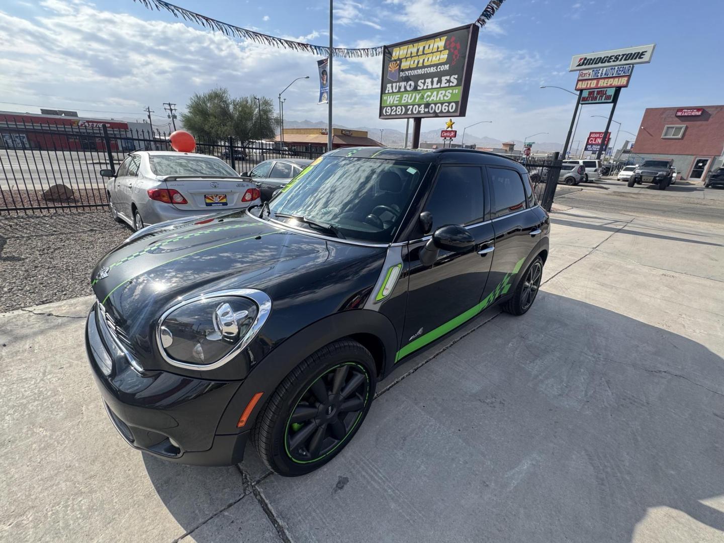 2013 Charcoal Mini Countryman S ALL4 (WMWZC5C57DW) with an 1.6L L4 DOHC 16V TURBO engine, located at 2190 Hwy 95, Bullhead City, AZ, 86442, (928) 704-0060, 0.000000, 0.000000 - 2013 mini cooper S all 4 edition. custom lime green interior trimmed racing seats. clean carfax. automatic, leather loaded. cool car lots of fun to drive. 63k miles - Photo#6