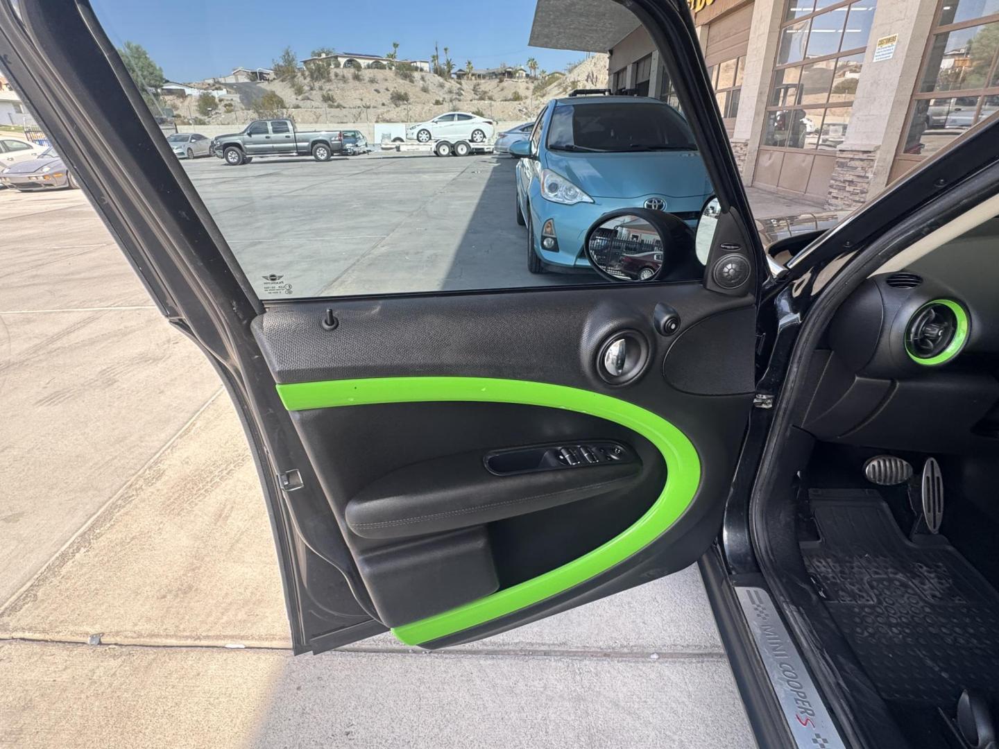 2013 Charcoal Mini Countryman S ALL4 (WMWZC5C57DW) with an 1.6L L4 DOHC 16V TURBO engine, located at 2190 Hwy 95, Bullhead City, AZ, 86442, (928) 704-0060, 0.000000, 0.000000 - 2013 mini cooper S all 4 edition. custom lime green interior trimmed racing seats. clean carfax. automatic, leather loaded. cool car lots of fun to drive. 63k miles - Photo#12