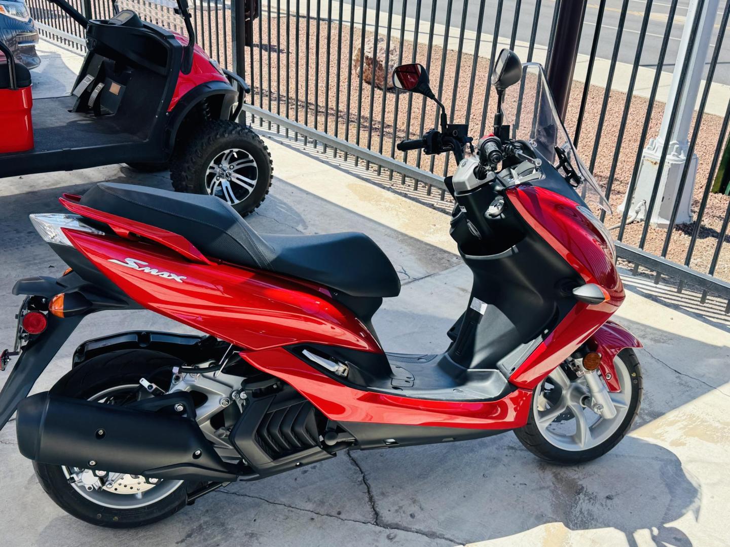 2019 Red Yamaha XC155 - (RKRSG36Y9KA) with an 155CC engine, located at 119 E Andy Devine Ave., Kingman, AZ, 86401, (928) 753-1946, 0.000000, 0.000000 - 2019 YAMAHA XC155. 1 OWNER . ONLY 249 MILES. STREET LEGAL. SUPER CLEAN , ALWAYS GARAGED. The 2019 Yamaha SMAX (model code XC155) is a 155cc, fuel-injected, four-stroke, liquid-cooled scooter with an automatic CVT transmission. It features hydraulic disc brakes, 13-inch wheels, and a lightweight, rig - Photo#2