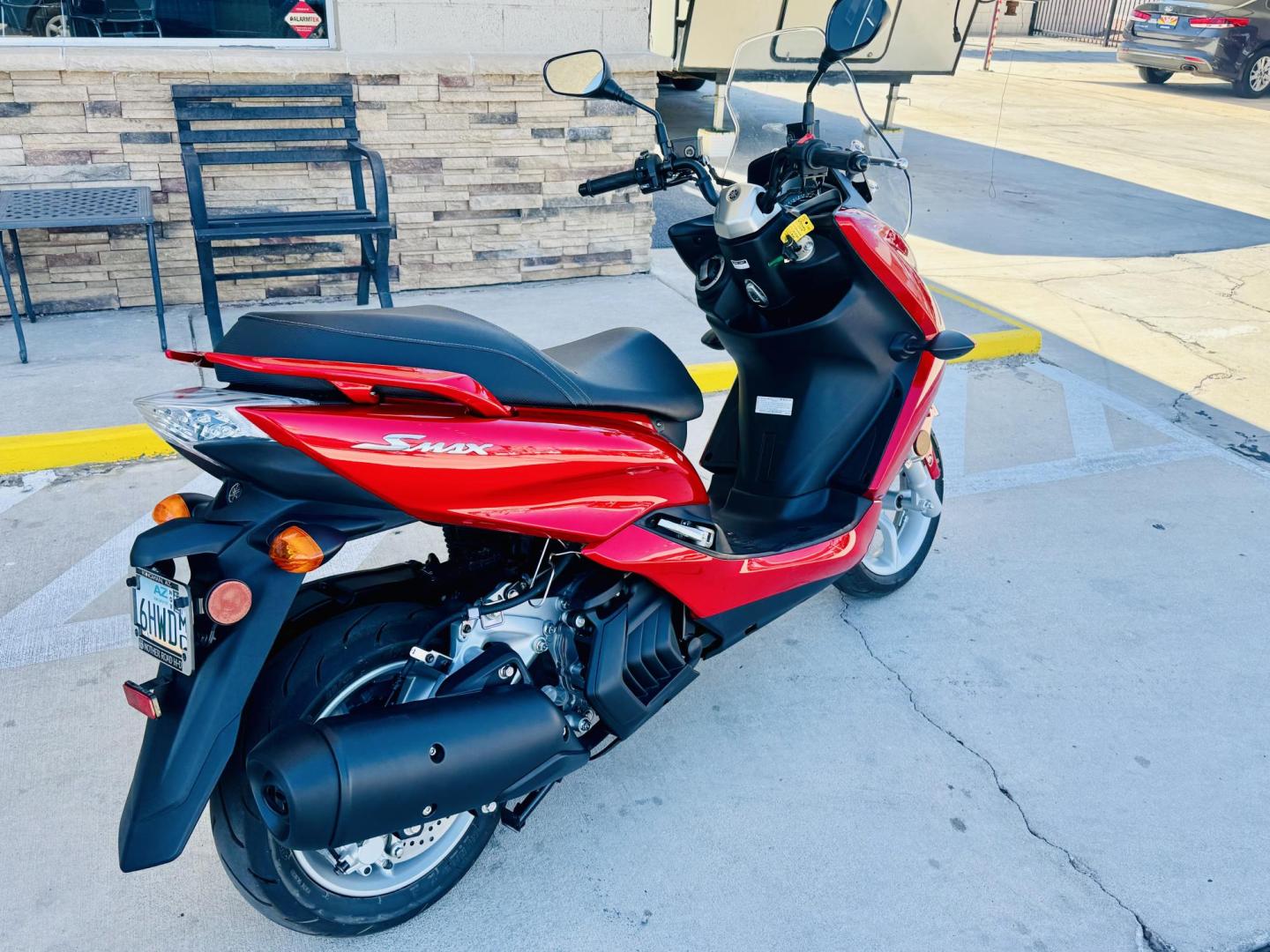 2019 Red Yamaha XC155 - (RKRSG36Y9KA) with an 155CC engine, located at 119 E Andy Devine Ave., Kingman, AZ, 86401, (928) 753-1946, 0.000000, 0.000000 - 2019 YAMAHA XC155. 1 OWNER . ONLY 249 MILES. STREET LEGAL. SUPER CLEAN , ALWAYS GARAGED. The 2019 Yamaha SMAX (model code XC155) is a 155cc, fuel-injected, four-stroke, liquid-cooled scooter with an automatic CVT transmission. It features hydraulic disc brakes, 13-inch wheels, and a lightweight, rig - Photo#3