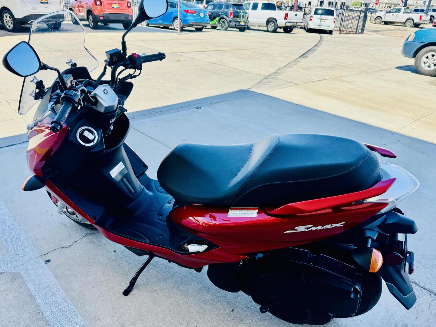 2019 Red Yamaha XC155 - (RKRSG36Y9KA) with an 155CC engine, located at 119 E Andy Devine Ave., Kingman, AZ, 86401, (928) 753-1946, 0.000000, 0.000000 - 2019 YAMAHA XC155. 1 OWNER . ONLY 249 MILES. STREET LEGAL. SUPER CLEAN , ALWAYS GARAGED. The 2019 Yamaha SMAX (model code XC155) is a 155cc, fuel-injected, four-stroke, liquid-cooled scooter with an automatic CVT transmission. It features hydraulic disc brakes, 13-inch wheels, and a lightweight, rig - Photo#7