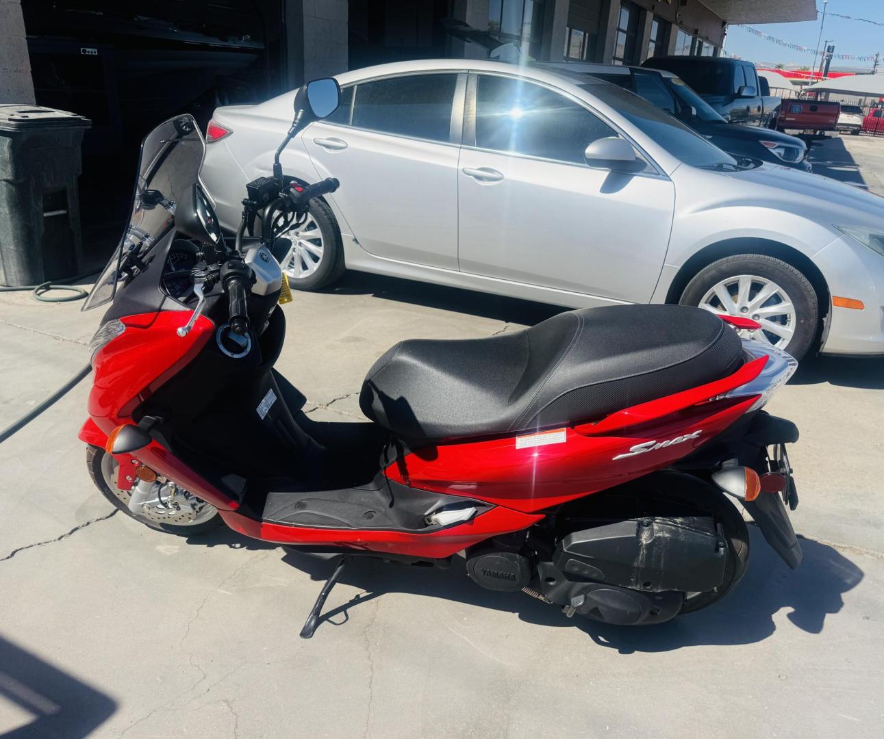 2019 Red Yamaha XC155 - (RKRSG36Y9KA) with an 155CC engine, located at 119 E Andy Devine Ave., Kingman, AZ, 86401, (928) 753-1946, 0.000000, 0.000000 - 2019 YAMAHA XC155. 1 OWNER . ONLY 249 MILES. STREET LEGAL. SUPER CLEAN , ALWAYS GARAGED. The 2019 Yamaha SMAX (model code XC155) is a 155cc, fuel-injected, four-stroke, liquid-cooled scooter with an automatic CVT transmission. It features hydraulic disc brakes, 13-inch wheels, and a lightweight, rig - Photo#10