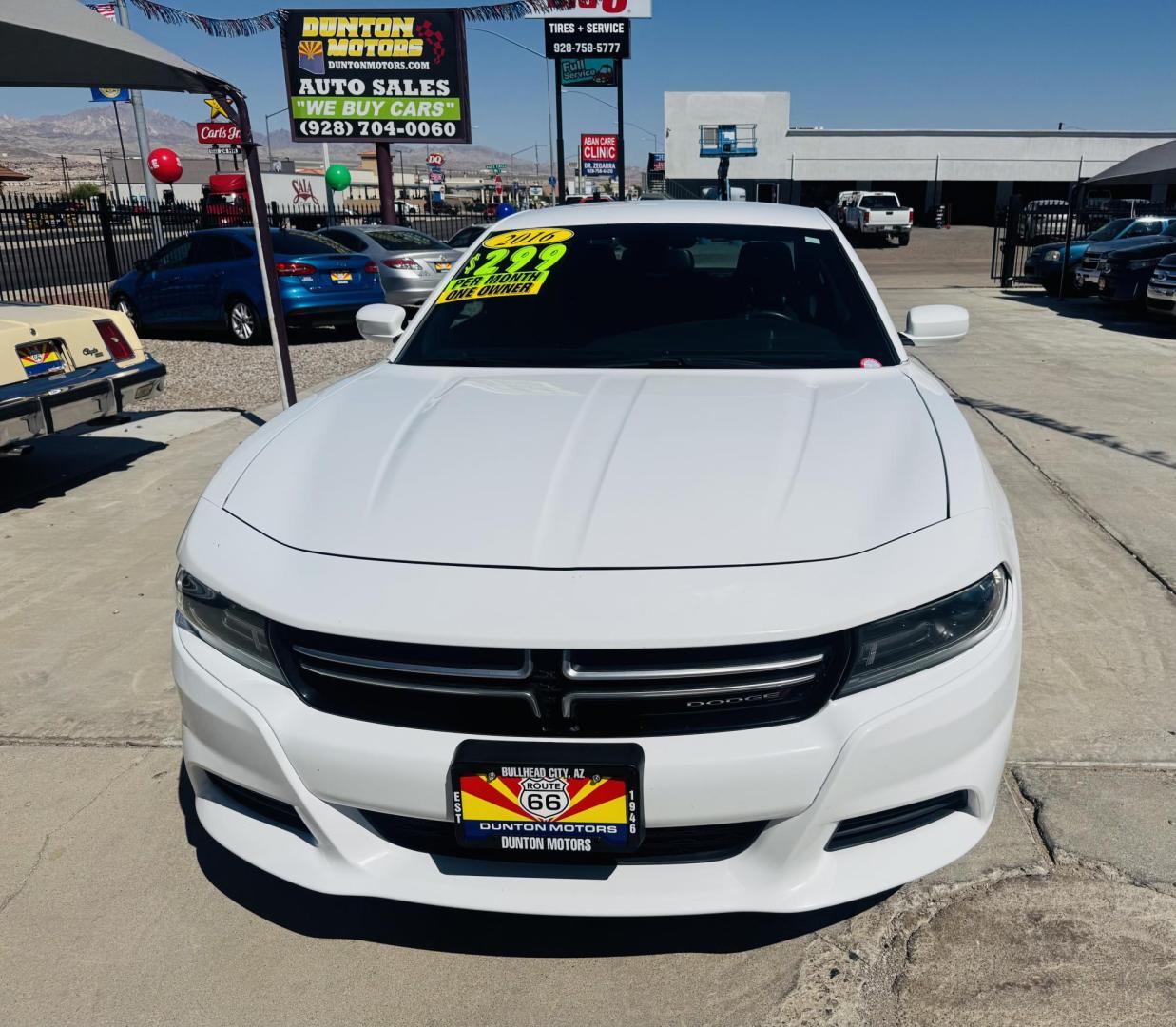 2016 White Dodge Charger SE (2C3CDXBG2GH) with an 3.6L V6 DOHC 24V engine, 8A transmission, located at 2190 Hwy 95, Bullhead City, AZ, 86442, (928) 704-0060, 0.000000, 0.000000 - 2016 Dodge Charger SE. 1 owner clean carfax. no accidents. Completely serviced. Free warranty. free carfax, financing available. - Photo#2