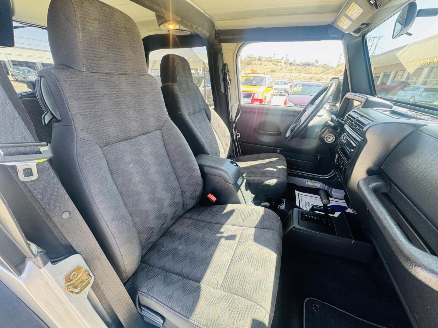 2005 Silver Jeep Wrangler Sport (1J4FA49S15P) with an 4.0L L6 OHV 12V engine, located at 2190 Hwy 95, Bullhead City, AZ, 86442, (928) 704-0060, 0.000000, 0.000000 - 2005 Jeep wrangler Sport. Automatic 4.0 V6. hard top , hard doors. ice cold a/c. brand new windshield. super super low original miles. Only 46,000. Arizona title. Free and clear . - Photo#10