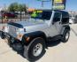 2005 Silver Jeep Wrangler Sport (1J4FA49S15P) with an 4.0L L6 OHV 12V engine, located at 2190 Hwy 95, Bullhead City, AZ, 86442, (928) 704-0060, 0.000000, 0.000000 - 2005 Jeep wrangler Sport. Automatic 4.0 V6. hard top , hard doors. ice cold a/c. brand new windshield. super super low original miles. Only 46,000. Arizona title. Free and clear . - Photo#12