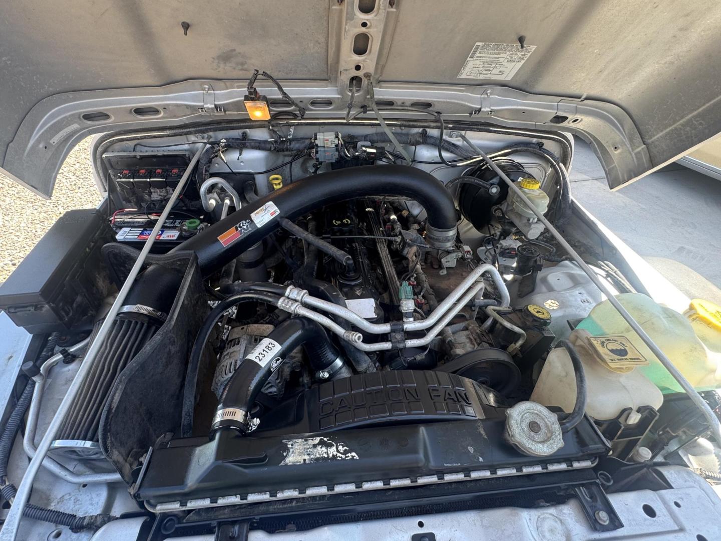 2005 Silver Jeep Wrangler Sport (1J4FA49S15P) with an 4.0L L6 OHV 12V engine, located at 2190 Hwy 95, Bullhead City, AZ, 86442, (928) 704-0060, 0.000000, 0.000000 - 2005 Jeep wrangler Sport. Automatic 4.0 V6. hard top , hard doors. ice cold a/c. brand new windshield. super super low original miles. Only 46,000. Arizona title. Free and clear . - Photo#15