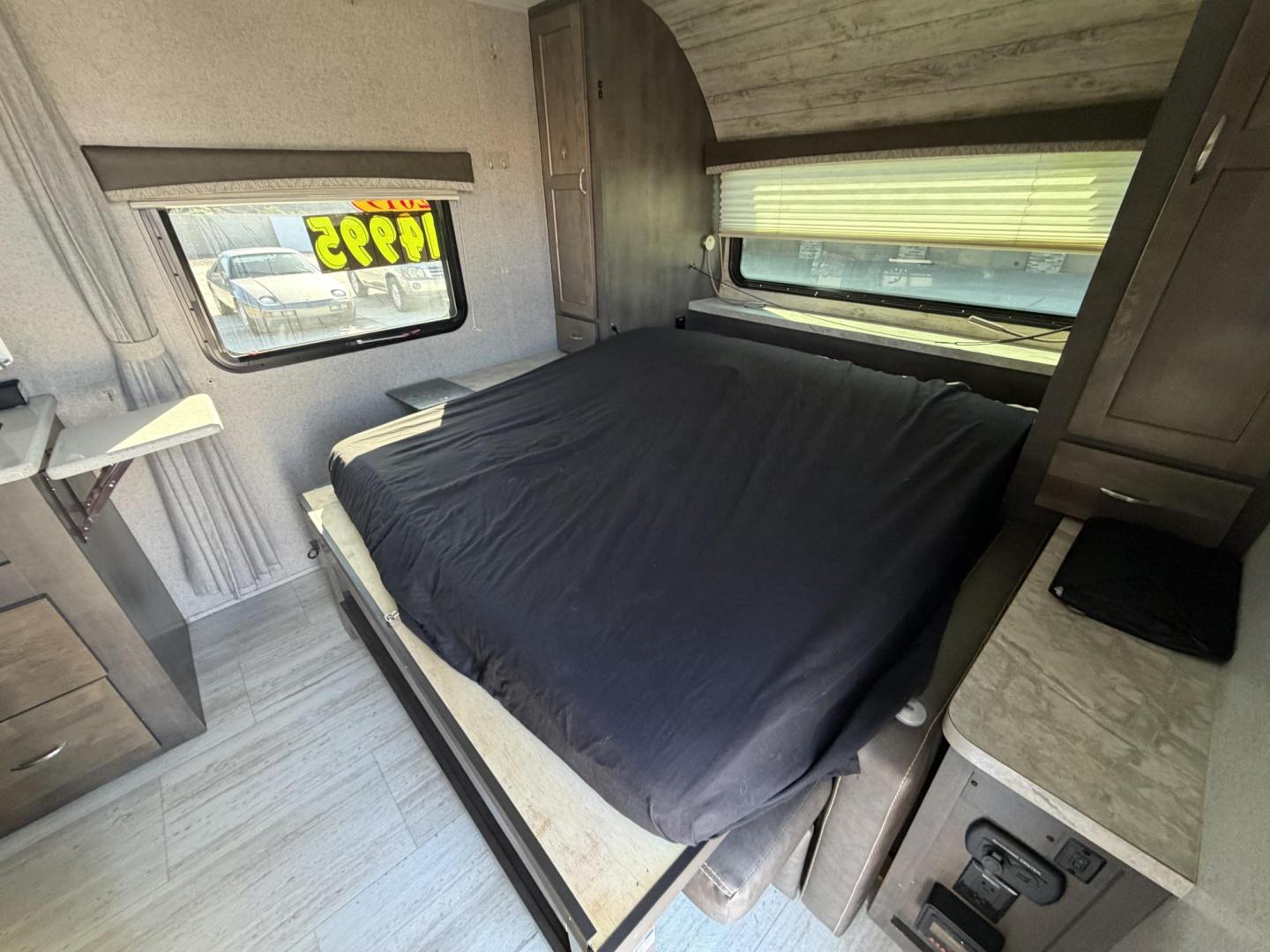 2019 White Forest River Rockwood Mini Lite 2306 - (4X4TRLY27KD) , located at 2190 Hwy 95, Bullhead City, AZ, 86442, (928) 704-0060, 0.000000, 0.000000 - On consignment, This super clean 2019 Forest River Rockwood 2306 travel trailer. Mini Lite. 23 ft. Electric tongue jack. 2 new batteries. electric awning. led lighting . sleeps 6. can easily be towed with half ton truck or suv. GVWR is 2660 lbs. has front folding bed. two bunk beds on side and dini - Photo#13
