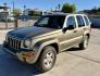 2004 Gold Jeep Liberty Limited 4WD (1J4GL58KX4W) with an 3.7L V6 SOHC 12V engine, 4-Speed Automatic Overdrive transmission, located at 2190 Hwy 95, Bullhead City, AZ, 86442, (928) 704-0060, 0.000000, 0.000000 - Photo#0