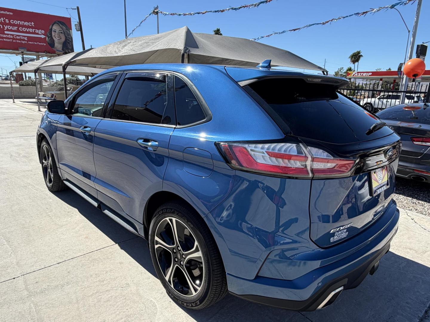 2019 Blue metallic /black Ford Edge Sport AWD (2FMPK4AP2KB) with an 2.7L V6 DOCH 24V engine, 6A transmission, located at 2190 Hwy 95, Bullhead City, AZ, 86442, (928) 704-0060, 0.000000, 0.000000 - 2019 Ford Edge. All wheel drive. 1 owner. only 74k miles. Elderly owned. Fully loaded. leather, moonroof, heater and cooled seats. backup camera, free carfax, free warranty. custom front sports bra , seat covers, dash matt. this customer took excellent care of this super clean great running SUV. own - Photo#2
