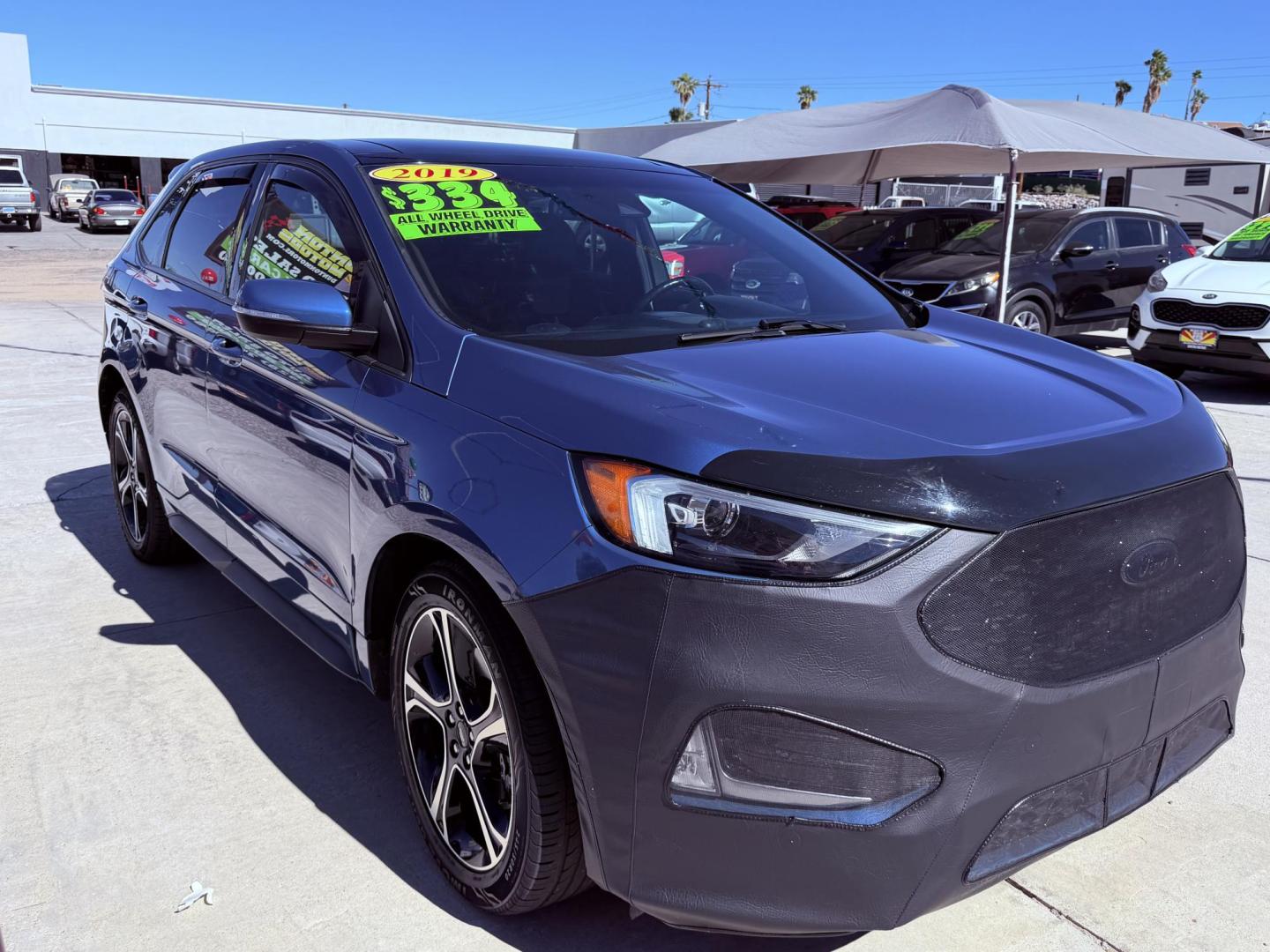 2019 Blue metallic /black Ford Edge Sport AWD (2FMPK4AP2KB) with an 2.7L V6 DOCH 24V engine, 6A transmission, located at 2190 Hwy 95, Bullhead City, AZ, 86442, (928) 704-0060, 0.000000, 0.000000 - 2019 Ford Edge. All wheel drive. 1 owner. only 74k miles. Elderly owned. Fully loaded. leather, moonroof, heater and cooled seats. backup camera, free carfax, free warranty. custom front sports bra , seat covers, dash matt. this customer took excellent care of this super clean great running SUV. own - Photo#1