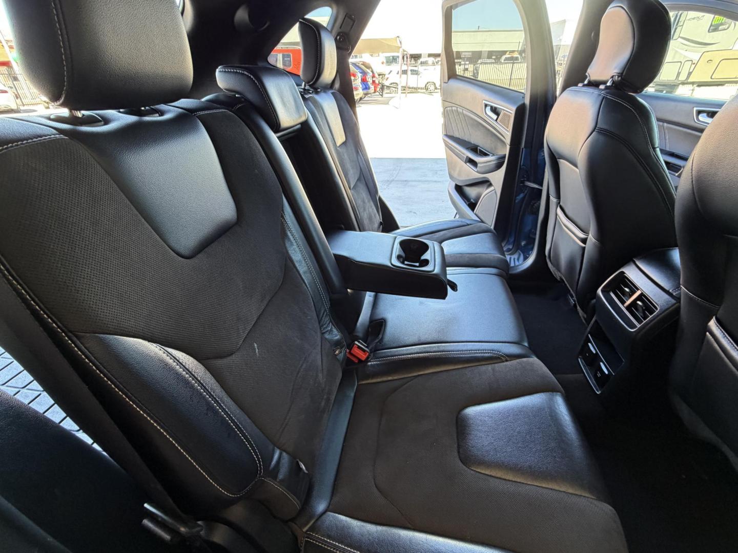 2019 Blue metallic /black Ford Edge Sport AWD (2FMPK4AP2KB) with an 2.7L V6 DOCH 24V engine, 6A transmission, located at 2190 Hwy 95, Bullhead City, AZ, 86442, (928) 704-0060, 0.000000, 0.000000 - 2019 Ford Edge. All wheel drive. 1 owner. only 74k miles. Elderly owned. Fully loaded. leather, moonroof, heater and cooled seats. backup camera, free carfax, free warranty. custom front sports bra , seat covers, dash matt. this customer took excellent care of this super clean great running SUV. own - Photo#13