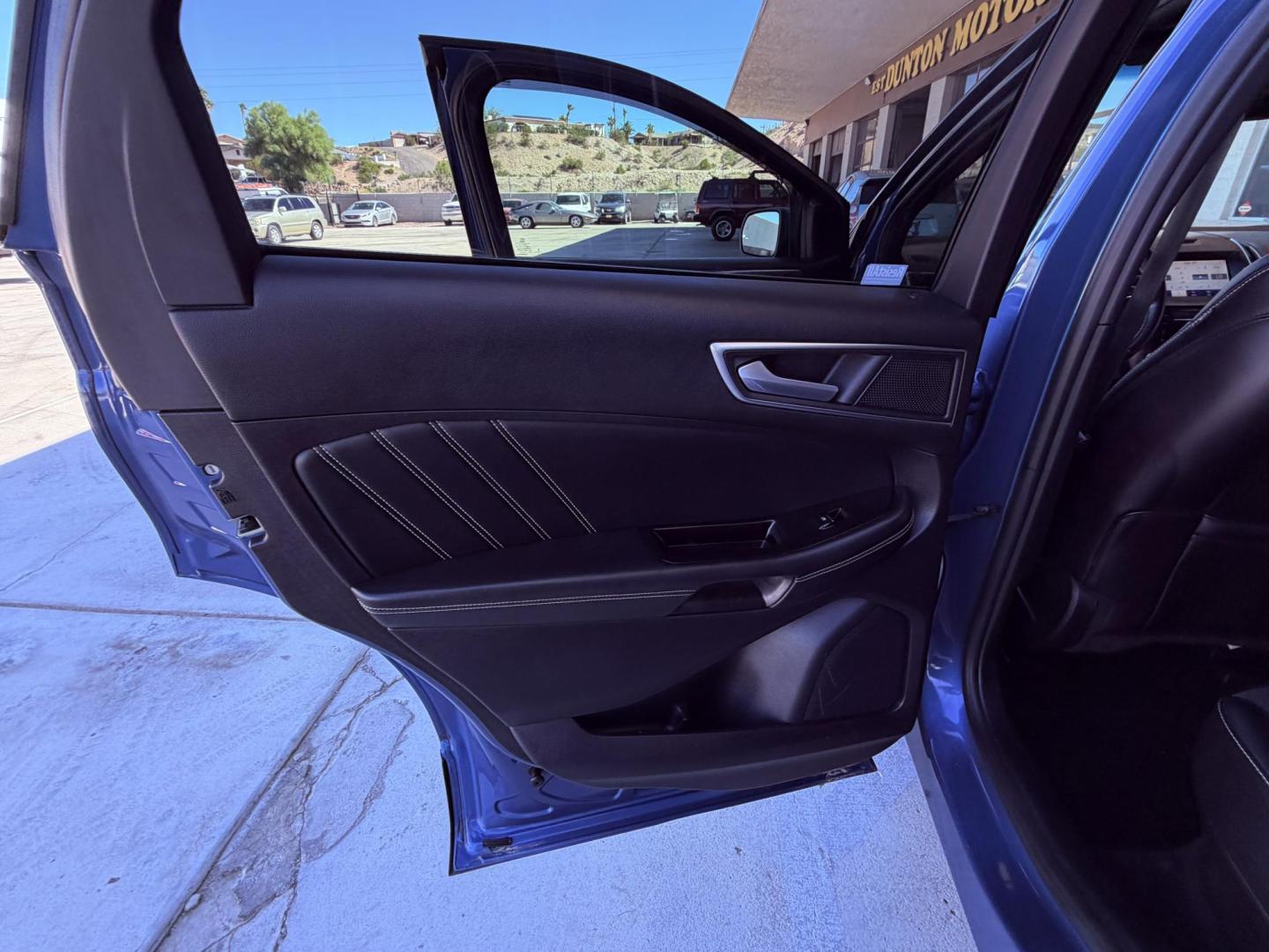 2019 Blue metallic /black Ford Edge Sport AWD (2FMPK4AP2KB) with an 2.7L V6 DOCH 24V engine, 6A transmission, located at 2190 Hwy 95, Bullhead City, AZ, 86442, (928) 704-0060, 0.000000, 0.000000 - 2019 Ford Edge. All wheel drive. 1 owner. only 74k miles. Elderly owned. Fully loaded. leather, moonroof, heater and cooled seats. backup camera, free carfax, free warranty. custom front sports bra , seat covers, dash matt. this customer took excellent care of this super clean great running SUV. own - Photo#14