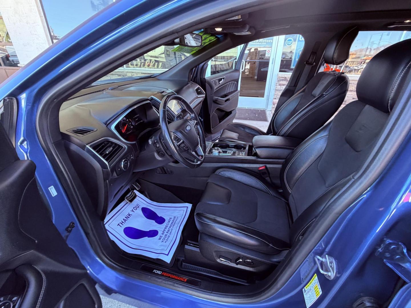 2019 Blue metallic /black Ford Edge Sport AWD (2FMPK4AP2KB) with an 2.7L V6 DOCH 24V engine, 6A transmission, located at 2190 Hwy 95, Bullhead City, AZ, 86442, (928) 704-0060, 0.000000, 0.000000 - 2019 Ford Edge. All wheel drive. 1 owner. only 74k miles. Elderly owned. Fully loaded. leather, moonroof, heater and cooled seats. backup camera, free carfax, free warranty. custom front sports bra , seat covers, dash matt. this customer took excellent care of this super clean great running SUV. own - Photo#16