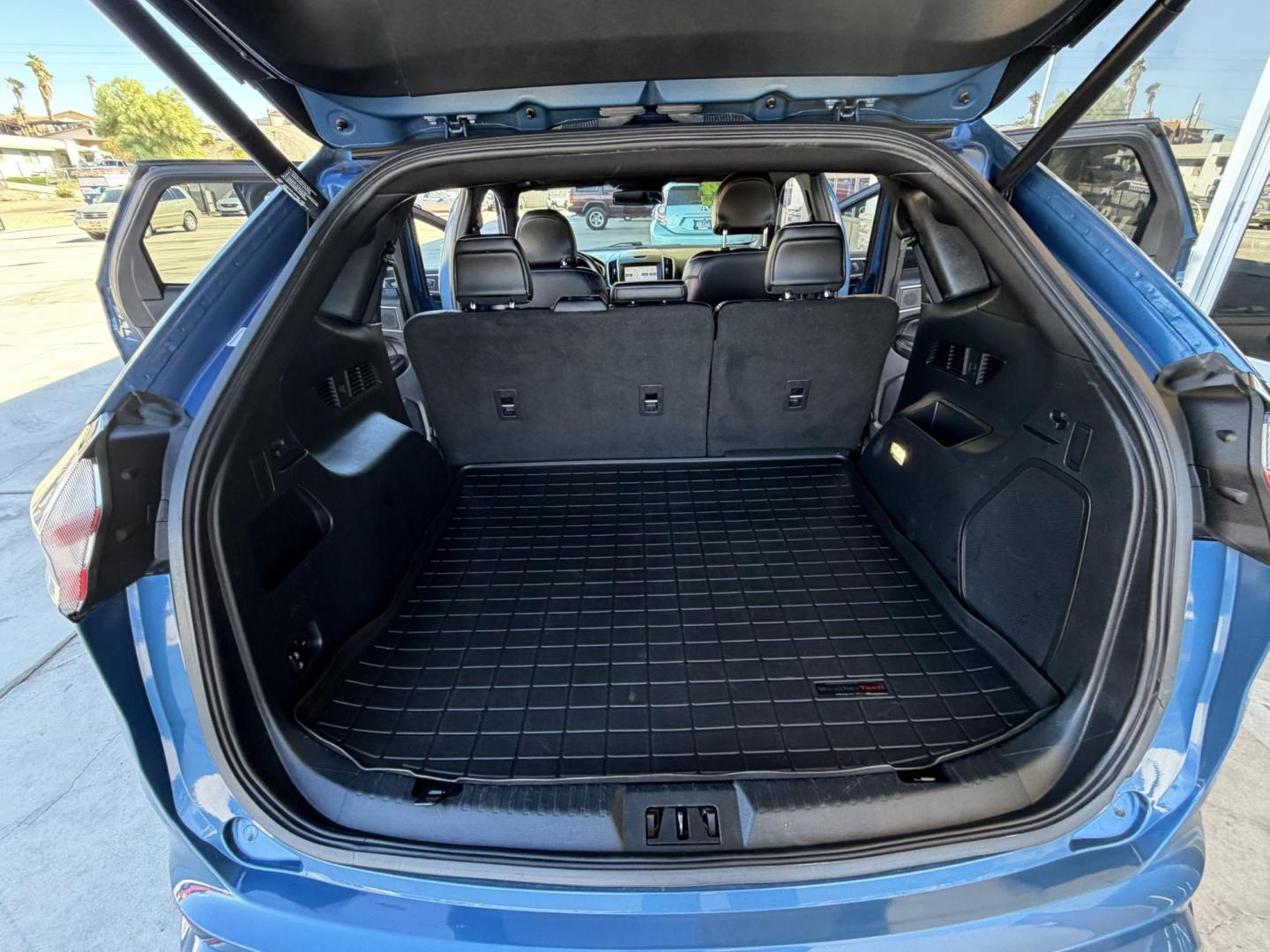 2019 Blue metallic /black Ford Edge Sport AWD (2FMPK4AP2KB) with an 2.7L V6 DOCH 24V engine, 6A transmission, located at 2190 Hwy 95, Bullhead City, AZ, 86442, (928) 704-0060, 0.000000, 0.000000 - 2019 Ford Edge. All wheel drive. 1 owner. only 74k miles. Elderly owned. Fully loaded. leather, moonroof, heater and cooled seats. backup camera, free carfax, free warranty. custom front sports bra , seat covers, dash matt. this customer took excellent care of this super clean great running SUV. own - Photo#17