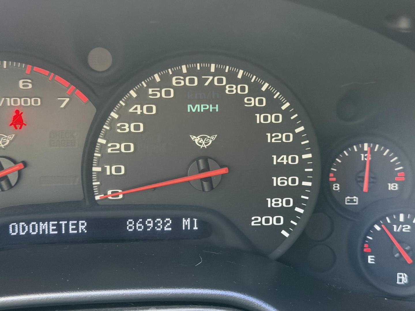 2000 Red /black Chevrolet Corvette Coupe (1G1YY22G5Y5) with an 5.7L V8 OHV 16V engine, located at 2190 Hwy 95, Bullhead City, AZ, 86442, (928) 704-0060, 0.000000, 0.000000 - super super super clean. 2000 Chevrolet Corvette. 2000 automatic. coupe. lots of extras, custom exhaust. 12 disc cd changer, corvette custom cover. Always garaged. custom calipers painted to match. Arizona title. On consignment. - Photo#5