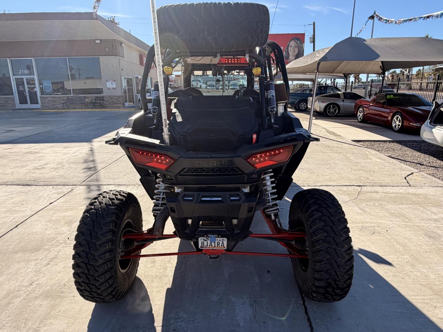 2014 Red Polaris Unknown - (4XA6T1EA2EB) , located at 2190 Hwy 95, Bullhead City, AZ, 86442, (928) 704-0060, 0.000000, 0.000000 - 2014 Polaris Rzr4 xp 1000. lots of extras, oversized tires. hard full windshield. soft top, spare tire w carrier. polaris gps screen and stereo system. WINCH,LIGHTS, WHIP BAR,THIS THING HAS TONS OF EXTRAS. Runs and drive great. Free and clear arizona title. - Photo#3