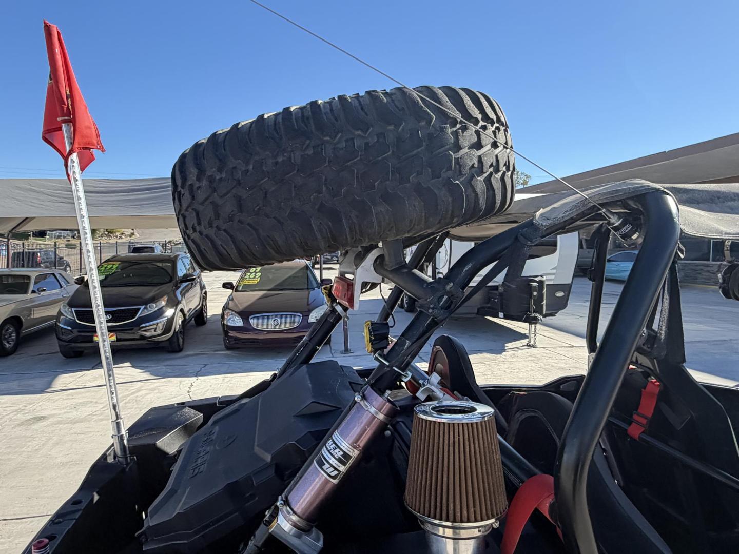 2014 Red Polaris Unknown - (4XA6T1EA2EB) , located at 2190 Hwy 95, Bullhead City, AZ, 86442, (928) 704-0060, 0.000000, 0.000000 - 2014 Polaris Rzr4 xp 1000. lots of extras, oversized tires. hard full windshield. soft top, spare tire w carrier. polaris gps screen and stereo system. WINCH,LIGHTS, WHIP BAR,THIS THING HAS TONS OF EXTRAS. Runs and drive great. Free and clear arizona title. - Photo#4