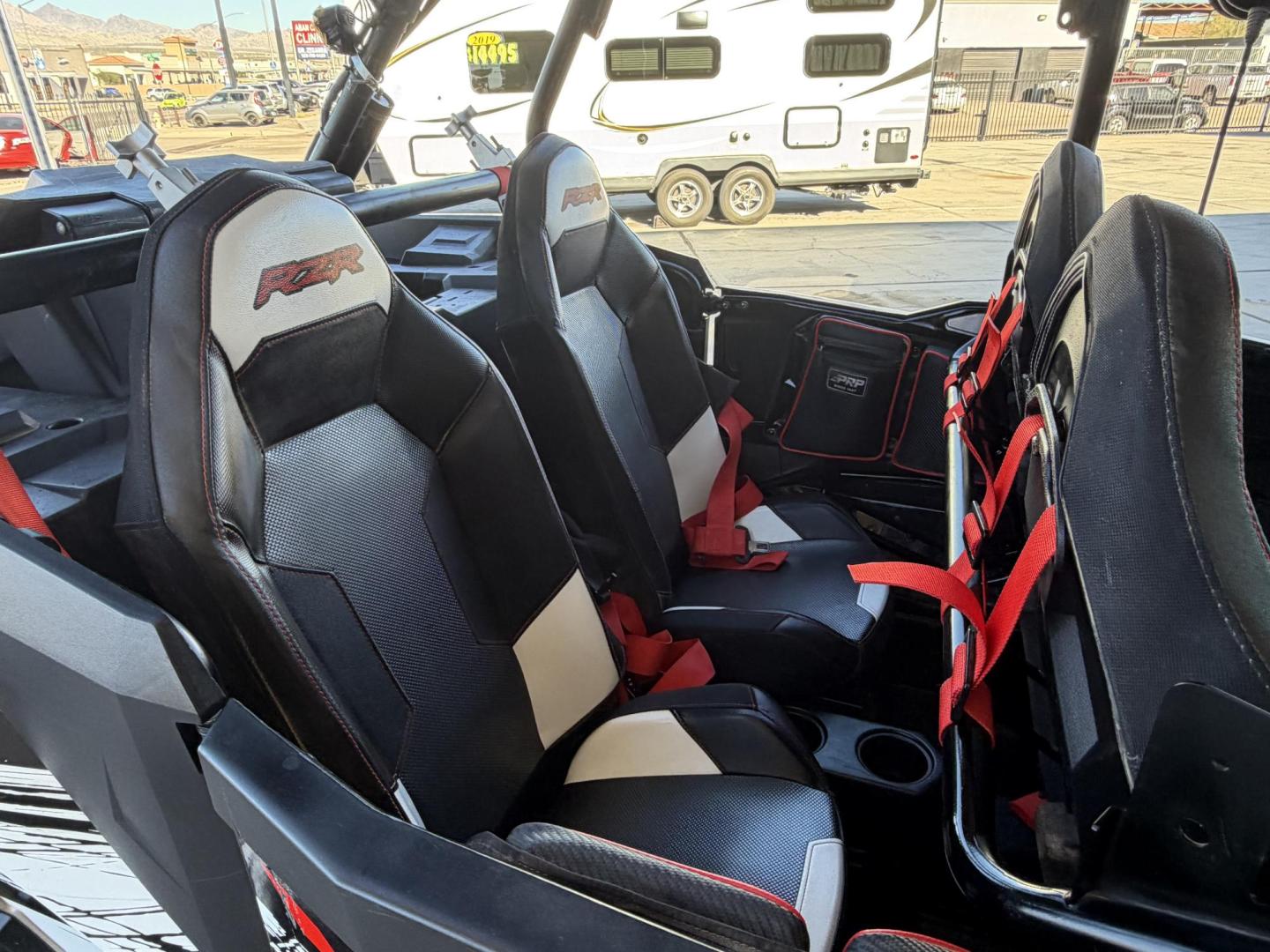 2014 Red Polaris Unknown - (4XA6T1EA2EB) , located at 2190 Hwy 95, Bullhead City, AZ, 86442, (928) 704-0060, 0.000000, 0.000000 - 2014 Polaris Rzr4 xp 1000. lots of extras, oversized tires. hard full windshield. soft top, spare tire w carrier. polaris gps screen and stereo system. WINCH,LIGHTS, WHIP BAR,THIS THING HAS TONS OF EXTRAS. Runs and drive great. Free and clear arizona title. - Photo#17