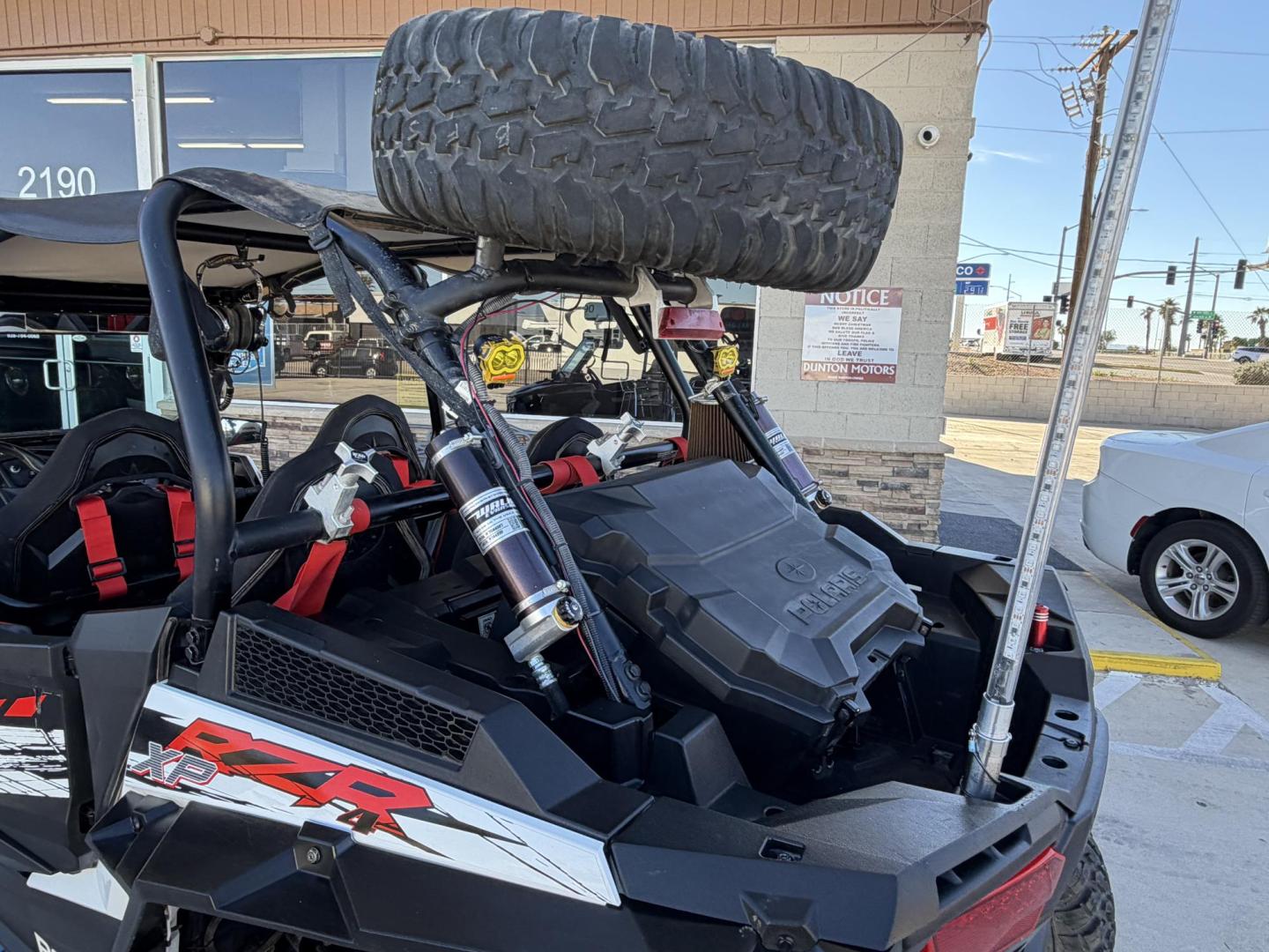 2014 Red Polaris Unknown - (4XA6T1EA2EB) , located at 2190 Hwy 95, Bullhead City, AZ, 86442, (928) 704-0060, 0.000000, 0.000000 - 2014 Polaris Rzr4 xp 1000. lots of extras, oversized tires. hard full windshield. soft top, spare tire w carrier. polaris gps screen and stereo system. WINCH,LIGHTS, WHIP BAR,THIS THING HAS TONS OF EXTRAS. Runs and drive great. Free and clear arizona title. - Photo#19