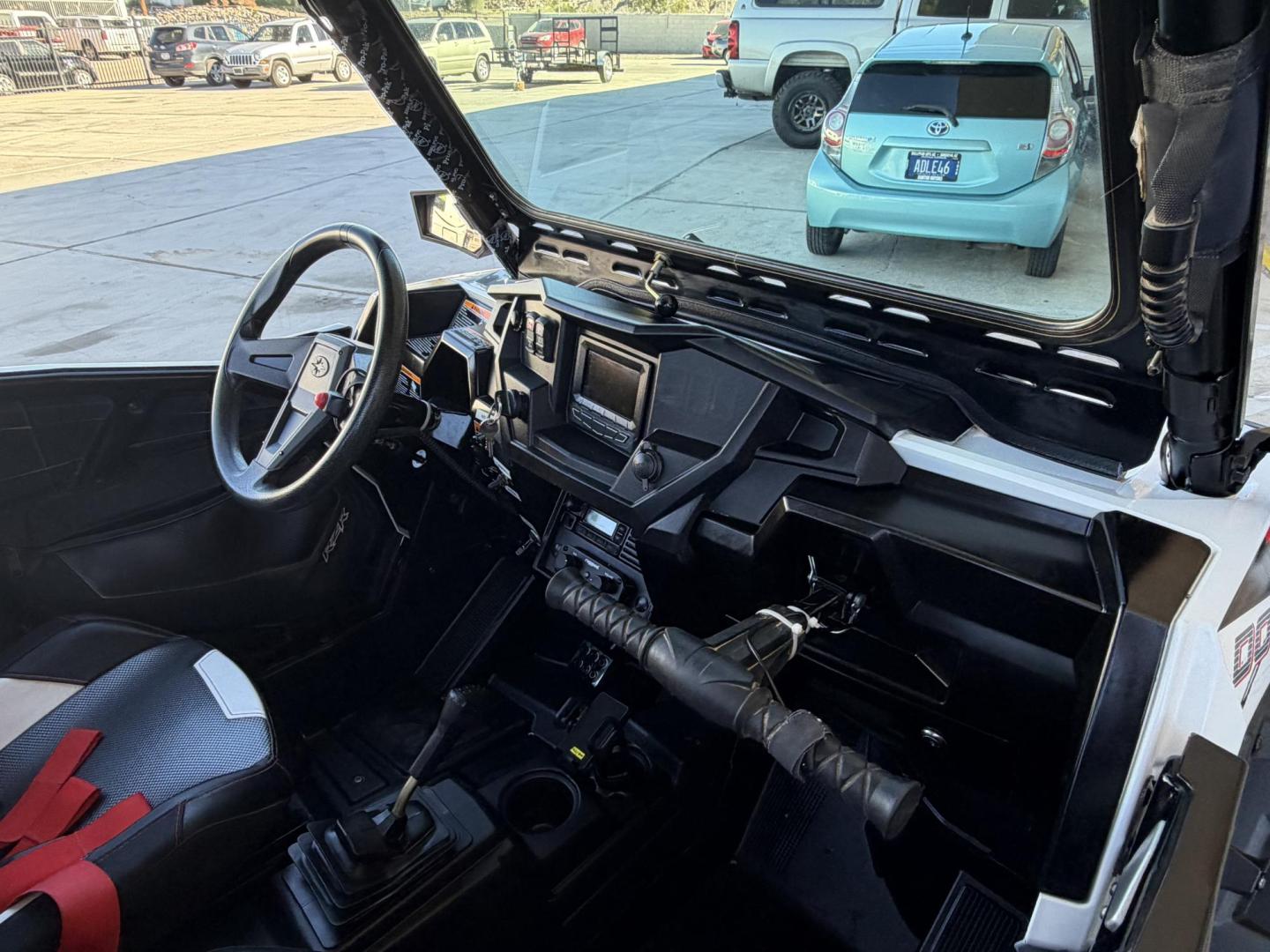 2014 Red Polaris Unknown - (4XA6T1EA2EB) , located at 2190 Hwy 95, Bullhead City, AZ, 86442, (928) 704-0060, 0.000000, 0.000000 - 2014 Polaris Rzr4 xp 1000. lots of extras, oversized tires. hard full windshield. soft top, spare tire w carrier. polaris gps screen and stereo system. WINCH,LIGHTS, WHIP BAR,THIS THING HAS TONS OF EXTRAS. Runs and drive great. Free and clear arizona title. - Photo#20