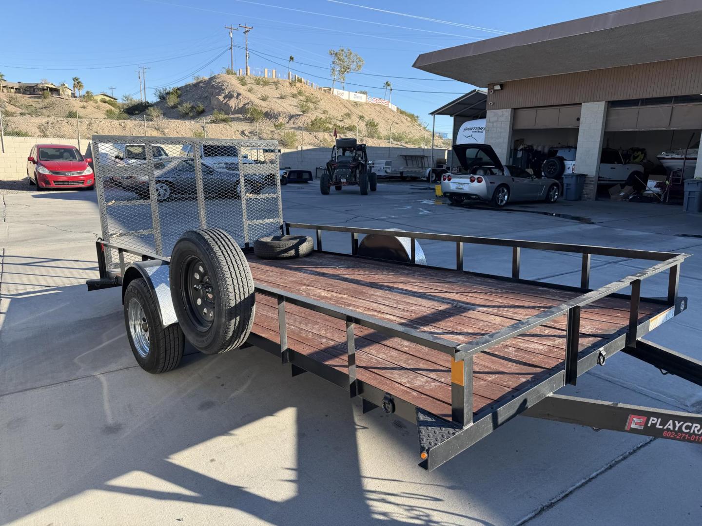 2021 black Playcraft 14 , located at 2190 Hwy 95, Bullhead City, AZ, 86442, (928) 704-0060, 0.000000, 0.000000 - 2021 Playcraft trailer 14 ft. full spare tire. in great shape. new tires . rear ramp. az title - Photo#2