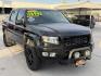 2014 Black /grey Honda Ridgeline Sport (5FPYK1F72EB) with an 3.5L V6 SOHC 24V engine, 5-Speed Automatic transmission, located at 2190 Hwy 95, Bullhead City, AZ, 86442, (928) 704-0060, 0.000000, 0.000000 - 2014 Honda Ridgeline 4x4. 3.5 V6 loaded Brand new tires and wheels. always serviced at the dealership. free and clear title. financing available we also take trade ins. - Photo#0