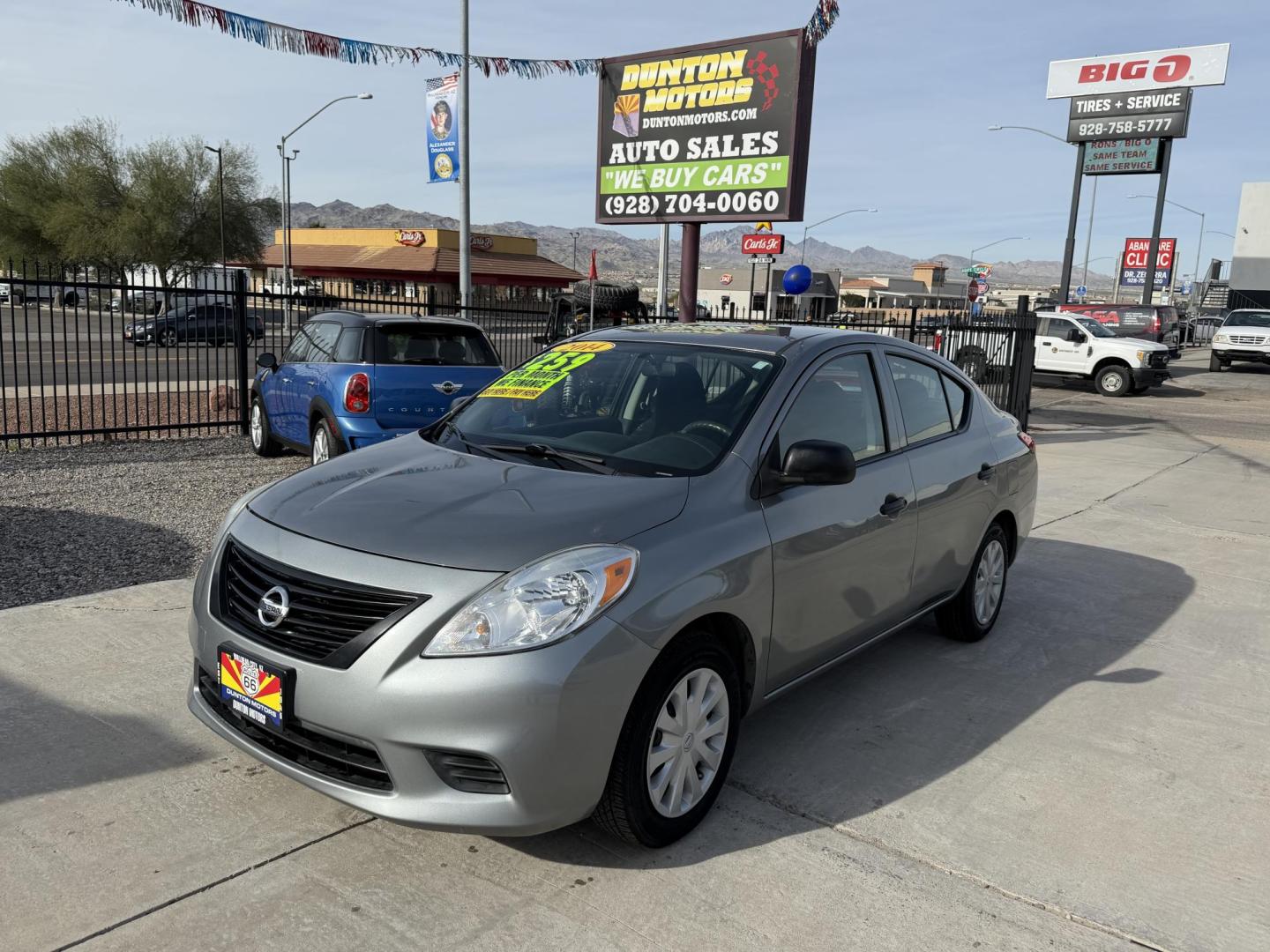 2014 Charcoal Nissan Versa 1.6 S 5M (3N1CN7AP8EL) with an 1.6L L4 DOHC 16V engine, 5-Speed Manual transmission, located at 2190 Hwy 95, Bullhead City, AZ, 86442, (928) 704-0060, 0.000000, 0.000000 - 2014 Nissan Versa S. Only 84k miles ice cold ac . Manual transmission. Great gas saver and commuter car . Low miles for the year . We finance , free warranty , free CARFAX - Photo#2