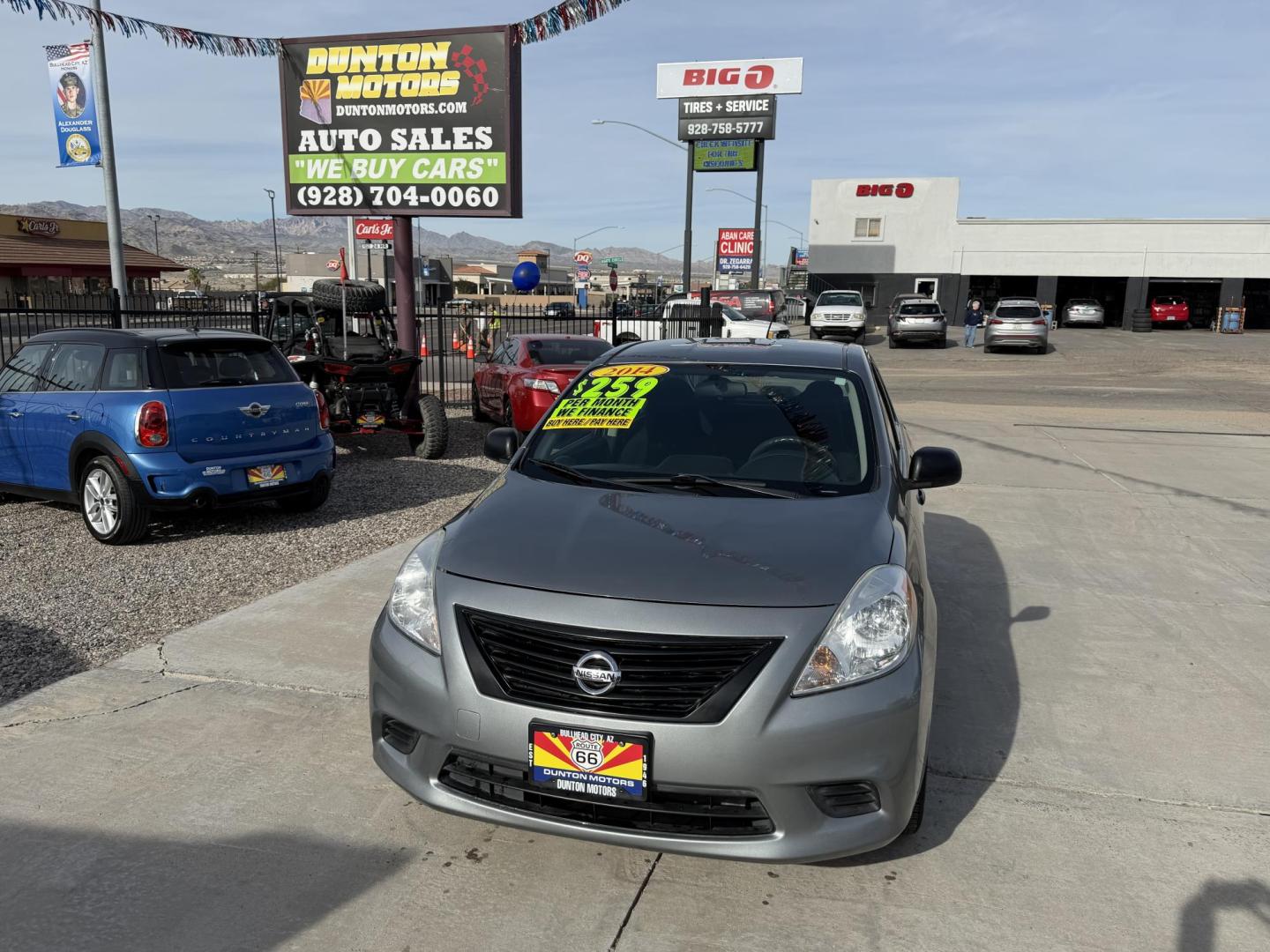 2014 Charcoal Nissan Versa 1.6 S 5M (3N1CN7AP8EL) with an 1.6L L4 DOHC 16V engine, 5-Speed Manual transmission, located at 2190 Hwy 95, Bullhead City, AZ, 86442, (928) 704-0060, 0.000000, 0.000000 - 2014 Nissan Versa S. Only 84k miles ice cold ac . Manual transmission. Great gas saver and commuter car . Low miles for the year . We finance , free warranty , free CARFAX - Photo#1