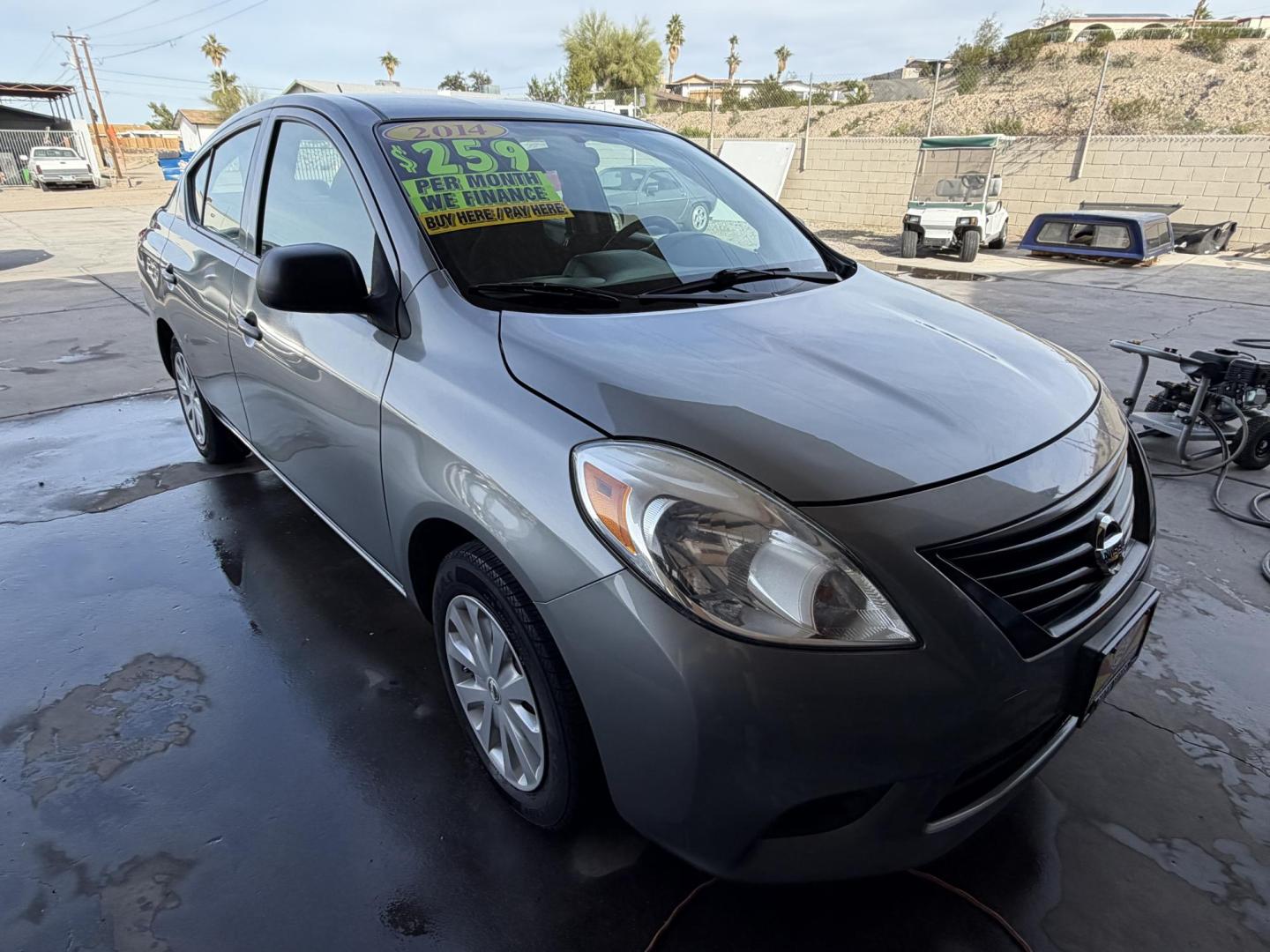 2014 Charcoal Nissan Versa 1.6 S 5M (3N1CN7AP8EL) with an 1.6L L4 DOHC 16V engine, 5-Speed Manual transmission, located at 2190 Hwy 95, Bullhead City, AZ, 86442, (928) 704-0060, 0.000000, 0.000000 - 2014 Nissan Versa S. Only 84k miles ice cold ac . Manual transmission. Great gas saver and commuter car . Low miles for the year . We finance , free warranty , free CARFAX - Photo#3