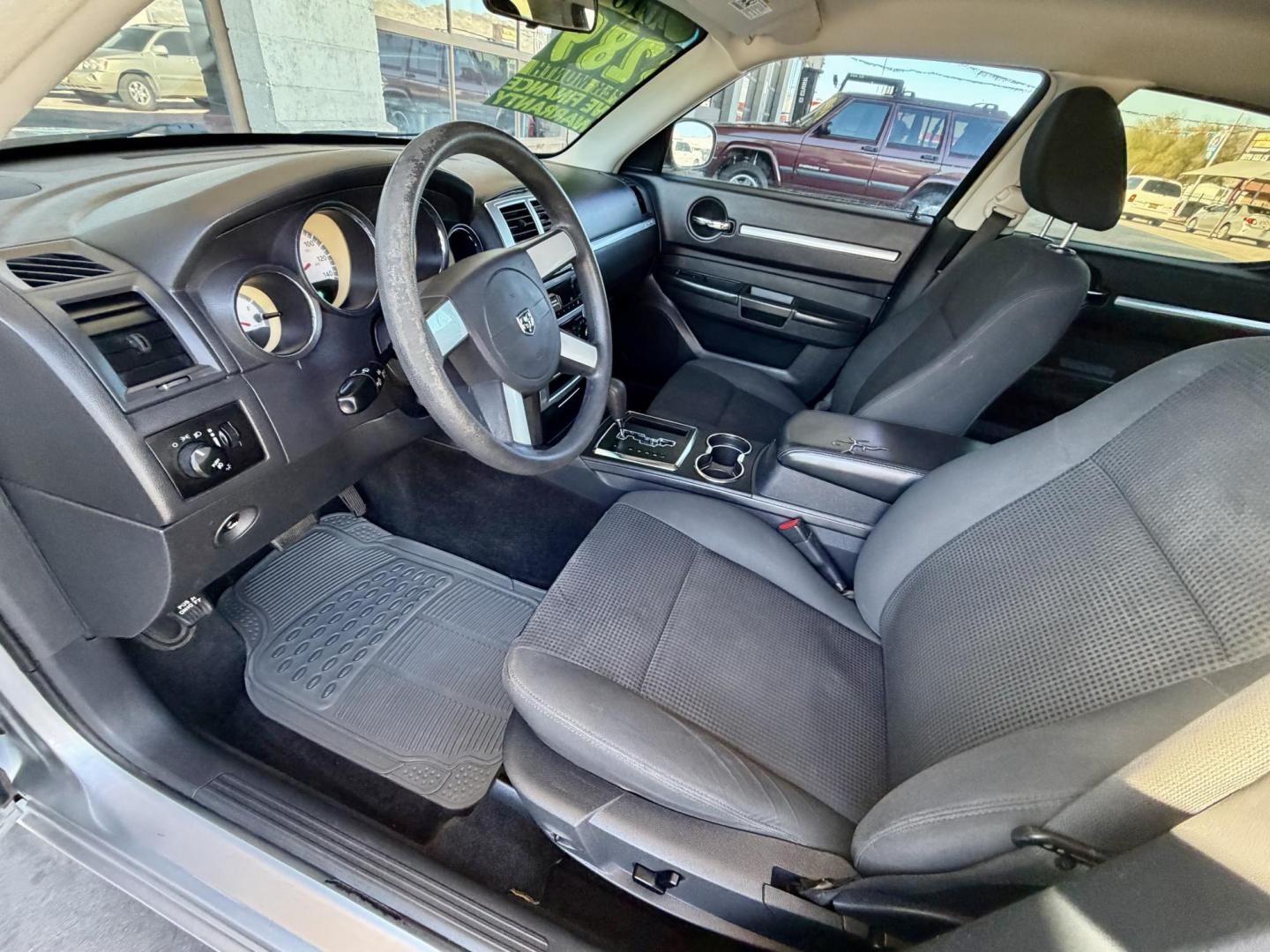 2010 Silver /BLACK Dodge Charger , located at 2190 Hwy 95, Bullhead City, AZ, 86442, (928) 704-0060, 0.000000, 0.000000 - 2012 Dodge Charger SXT. Brand new tires. 3.5 V6 engine. automatic transmission. power windows locks. cold ac. completely serviced. Runs and drives great. free warranty. free carfax . In house financing available. Only at Dunton Motors. - Photo#2