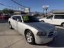 2010 Silver /BLACK Dodge Charger , located at 2190 Hwy 95, Bullhead City, AZ, 86442, (928) 704-0060, 0.000000, 0.000000 - 2012 Dodge Charger SXT. Brand new tires. 3.5 V6 engine. automatic transmission. power windows locks. cold ac. completely serviced. Runs and drives great. free warranty. free carfax . In house financing available. Only at Dunton Motors. - Photo#3