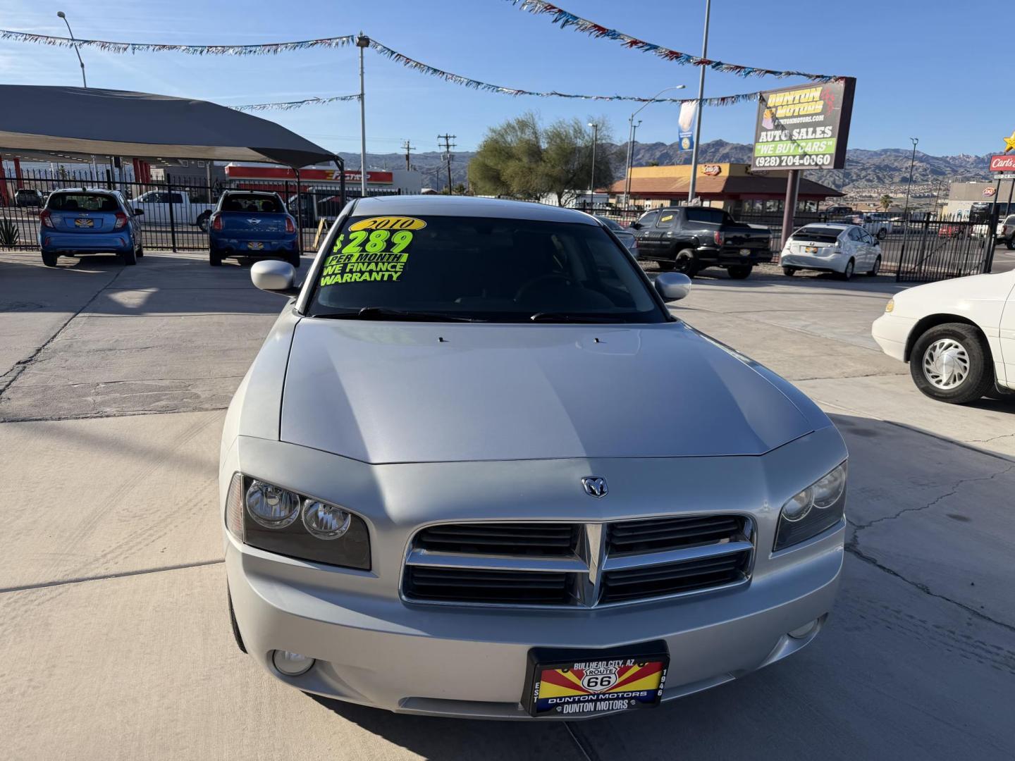 2010 Silver /BLACK Dodge Charger , located at 2190 Hwy 95, Bullhead City, AZ, 86442, (928) 704-0060, 0.000000, 0.000000 - 2012 Dodge Charger SXT. Brand new tires. 3.5 V6 engine. automatic transmission. power windows locks. cold ac. completely serviced. Runs and drives great. free warranty. free carfax . In house financing available. Only at Dunton Motors. - Photo#6