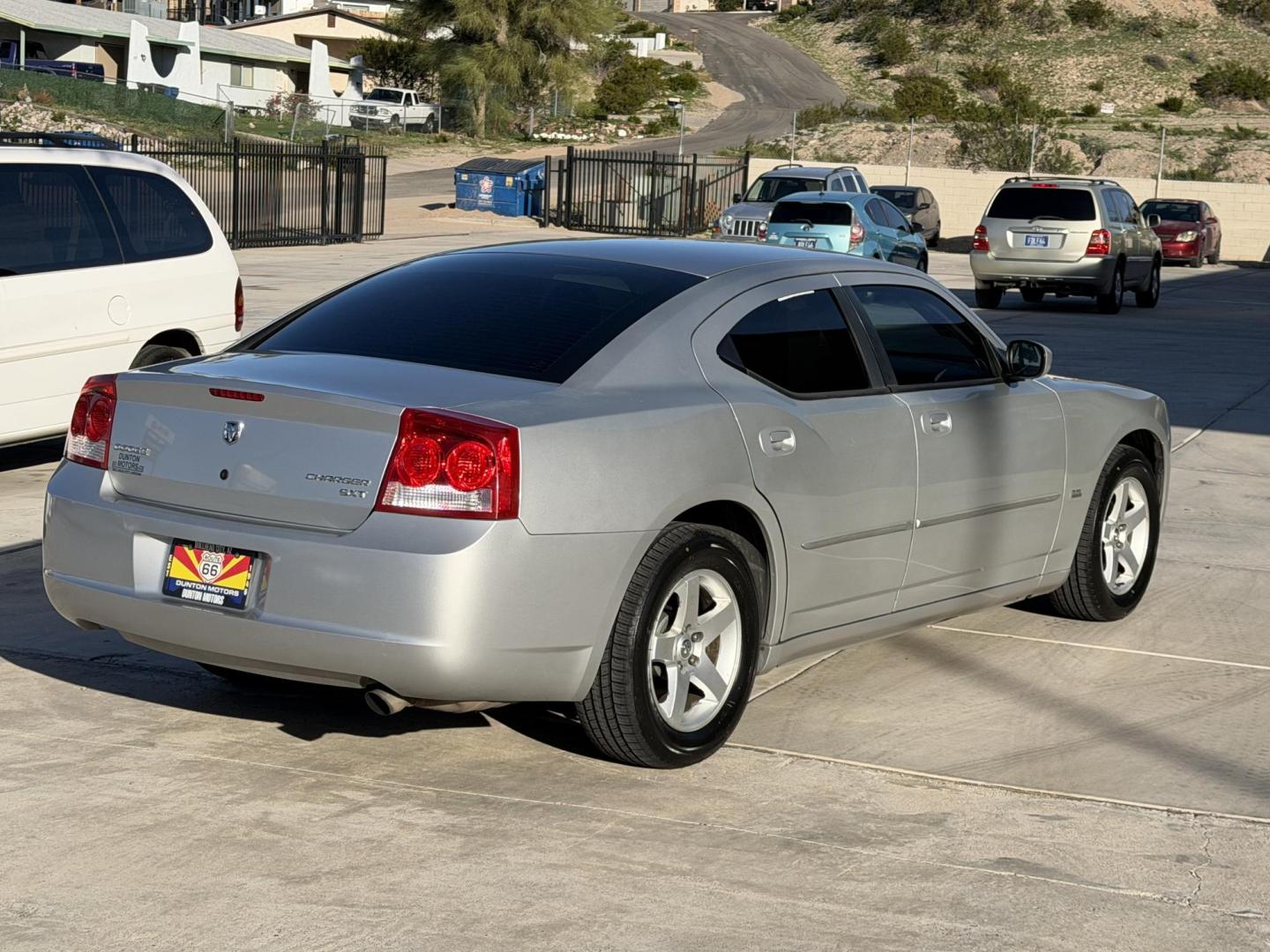 2010 Silver /BLACK Dodge Charger , located at 2190 Hwy 95, Bullhead City, AZ, 86442, (928) 704-0060, 0.000000, 0.000000 - 2012 Dodge Charger SXT. Brand new tires. 3.5 V6 engine. automatic transmission. power windows locks. cold ac. completely serviced. Runs and drives great. free warranty. free carfax . In house financing available. Only at Dunton Motors. - Photo#8
