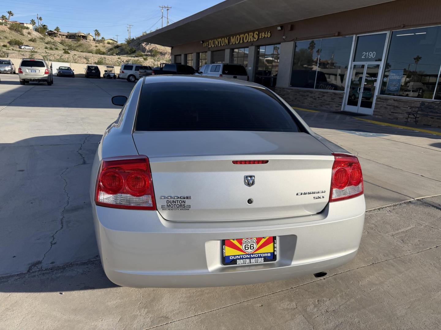 2010 Silver /BLACK Dodge Charger , located at 2190 Hwy 95, Bullhead City, AZ, 86442, (928) 704-0060, 0.000000, 0.000000 - 2012 Dodge Charger SXT. Brand new tires. 3.5 V6 engine. automatic transmission. power windows locks. cold ac. completely serviced. Runs and drives great. free warranty. free carfax . In house financing available. Only at Dunton Motors. - Photo#7