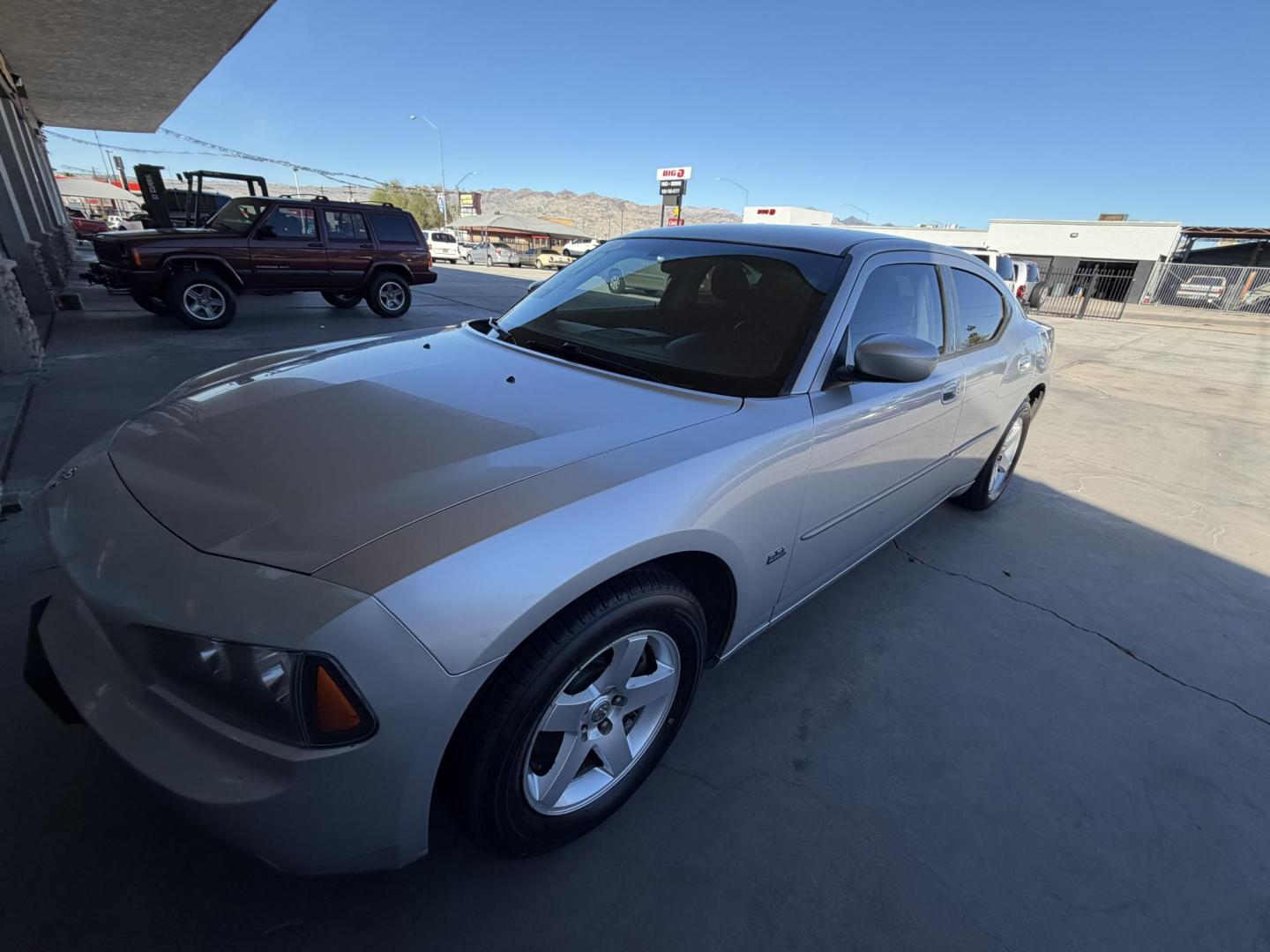 2010 Silver /BLACK Dodge Charger , located at 2190 Hwy 95, Bullhead City, AZ, 86442, (928) 704-0060, 0.000000, 0.000000 - 2012 Dodge Charger SXT. Brand new tires. 3.5 V6 engine. automatic transmission. power windows locks. cold ac. completely serviced. Runs and drives great. free warranty. free carfax . In house financing available. Only at Dunton Motors. - Photo#9