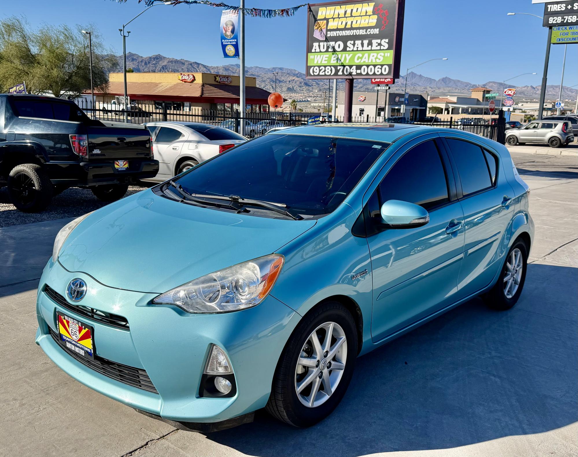 photo of 2013 Toyota Prius C 1 owner. 3 year engine warranty 