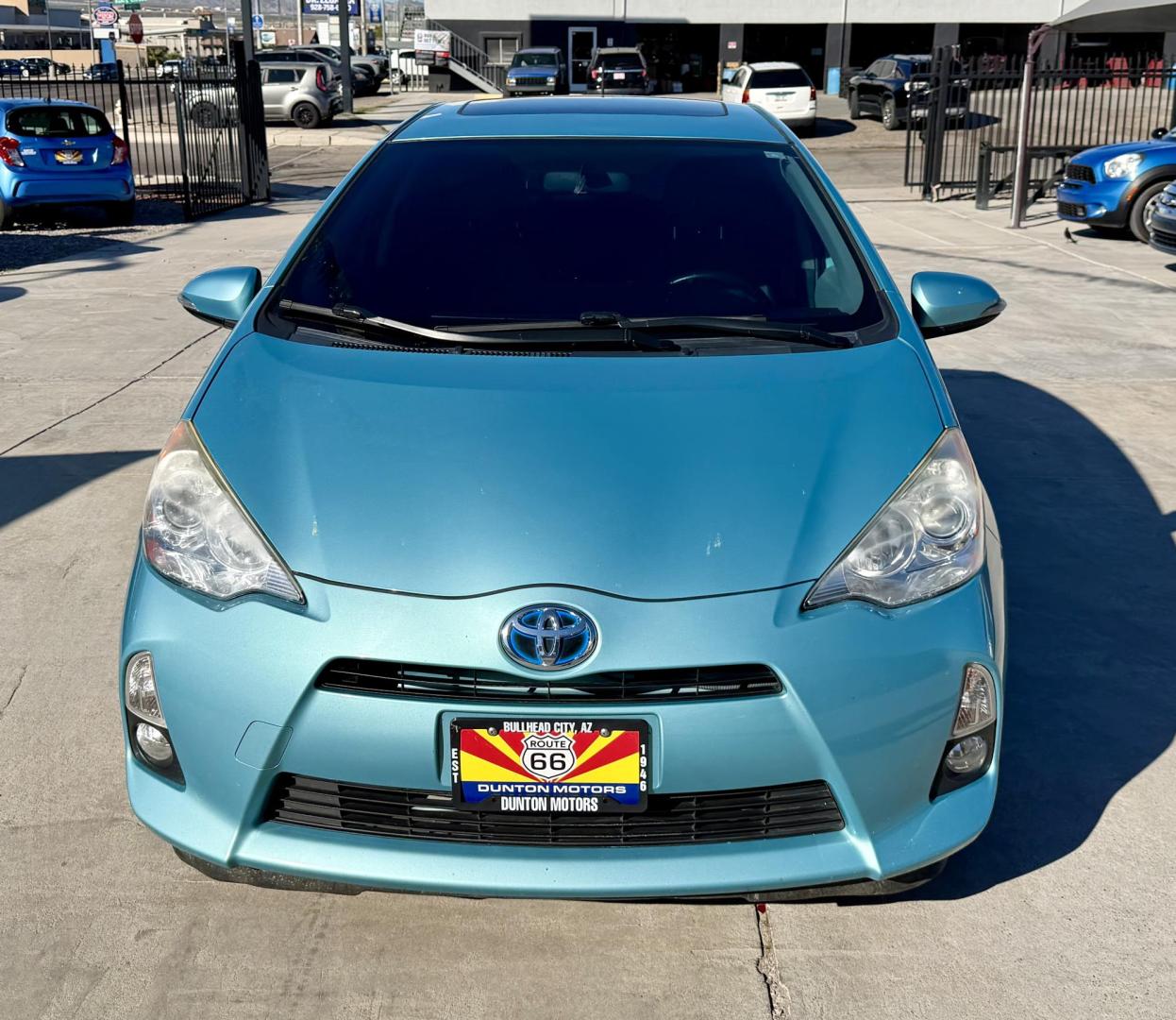 2013 Teal /black Toyota Prius four C , located at 2190 Hwy 95, Bullhead City, AZ, 86442, (928) 704-0060, 0.000000, 0.000000 - 2013 Toyota Prius four C . Hybrid. Leahter, moonroof, bluetooth, super tinted windows . Front window tint . Suns not coming in , satellite radio. fullyloaded. heated seats. keyless entry. beautiful rare Teal color. Michelin tires installed 6 months ago. Completely serviced. New prius battery with al - Photo#4