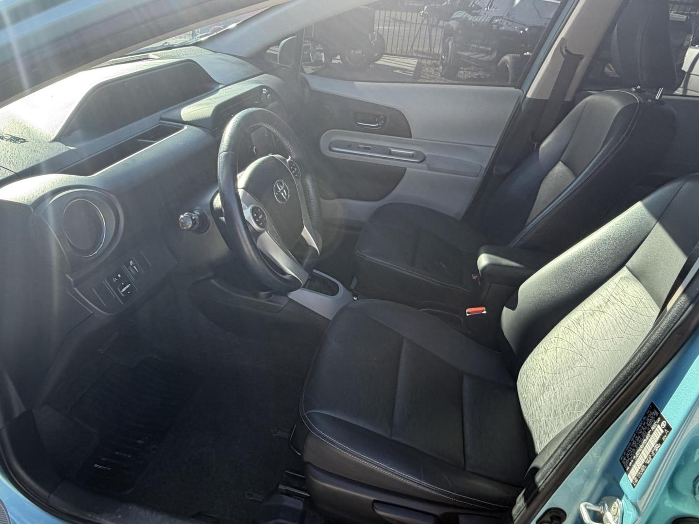 2013 Teal /black Toyota Prius four C , located at 2190 Hwy 95, Bullhead City, AZ, 86442, (928) 704-0060, 0.000000, 0.000000 - 2013 Toyota Prius four C . Hybrid. Leahter, moonroof, bluetooth, super tinted windows . Front window tint . Suns not coming in , satellite radio. fullyloaded. heated seats. keyless entry. beautiful rare Teal color. Michelin tires installed 6 months ago. Completely serviced. New prius battery with al - Photo#6