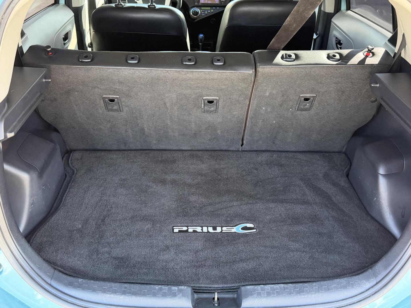 2013 Teal /black Toyota Prius four C , located at 2190 Hwy 95, Bullhead City, AZ, 86442, (928) 704-0060, 0.000000, 0.000000 - 2013 Toyota Prius four C . Hybrid. Leahter, moonroof, bluetooth, super tinted windows . Front window tint . Suns not coming in , satellite radio. fullyloaded. heated seats. keyless entry. beautiful rare Teal color. Michelin tires installed 6 months ago. Completely serviced. New prius battery with al - Photo#5