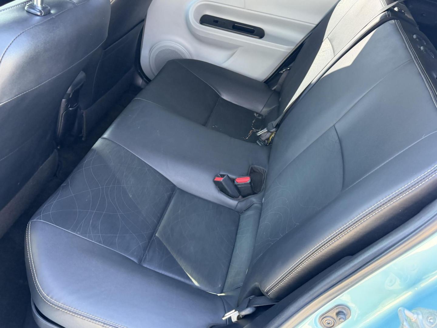 2013 Teal /black Toyota Prius four C , located at 2190 Hwy 95, Bullhead City, AZ, 86442, (928) 704-0060, 0.000000, 0.000000 - 2013 Toyota Prius four C . Hybrid. Leahter, moonroof, bluetooth, super tinted windows . Front window tint . Suns not coming in , satellite radio. fullyloaded. heated seats. keyless entry. beautiful rare Teal color. Michelin tires installed 6 months ago. Completely serviced. New prius battery with al - Photo#8