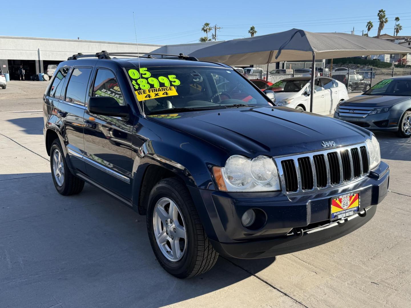 2005 Blue Jeep Grand Cherokee Limited 4WD (1J8HR58205C) with an 5.7L V8 OHV 16V engine, 5-Speed Automatic Overdrive transmission, located at 2190 Hwy 95, Bullhead City, AZ, 86442, (928) 704-0060, 0.000000, 0.000000 - Photo#1