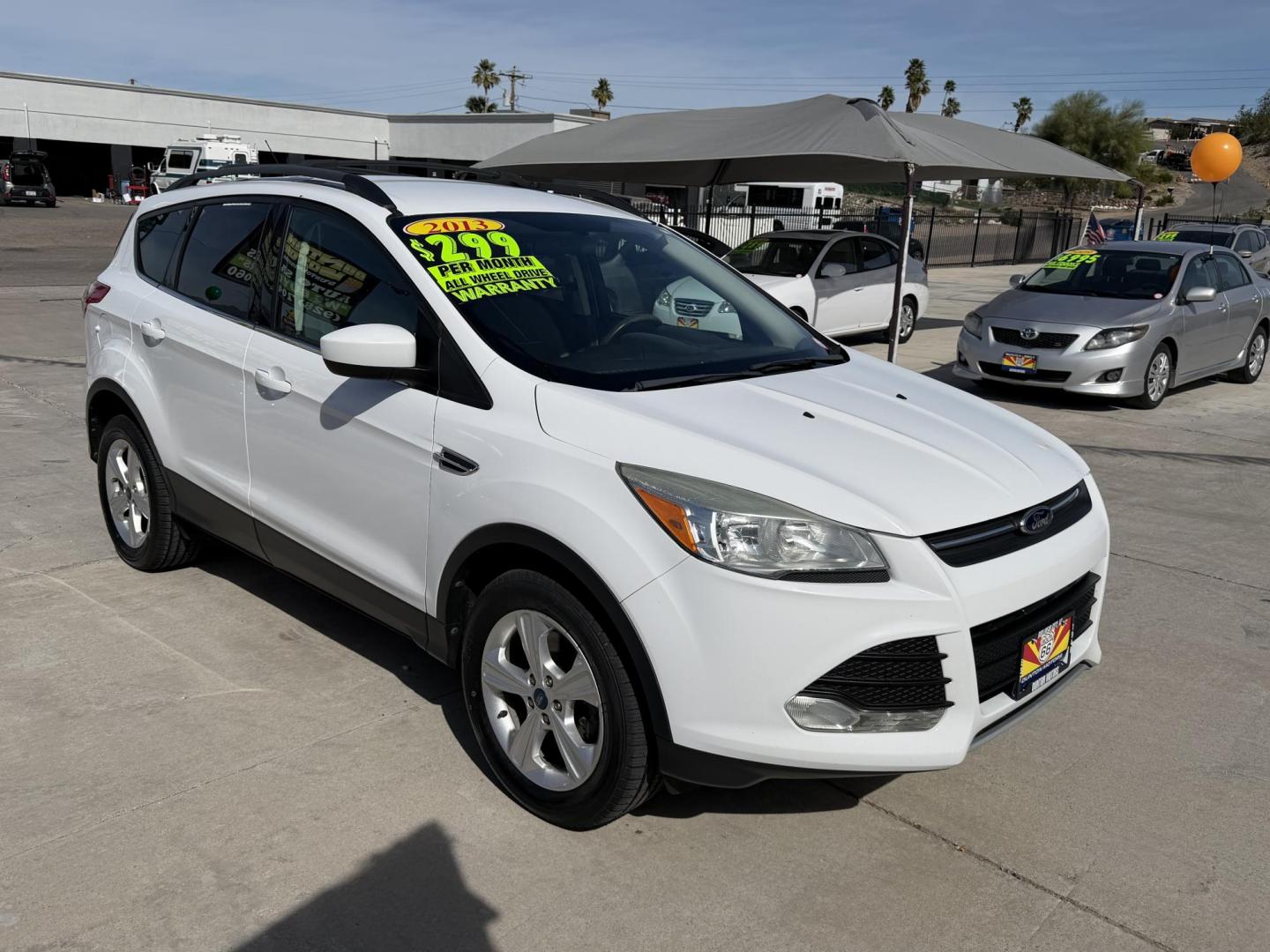 2013 White Ford Escape SE AWD (1FMCU9GX1DU) with an 1.6L L4 DOHC 16V engine, 6-Speed Automatic transmission, located at 2190 Hwy 95, Bullhead City, AZ, 86442, (928) 704-0060, 0.000000, 0.000000 - Photo#1