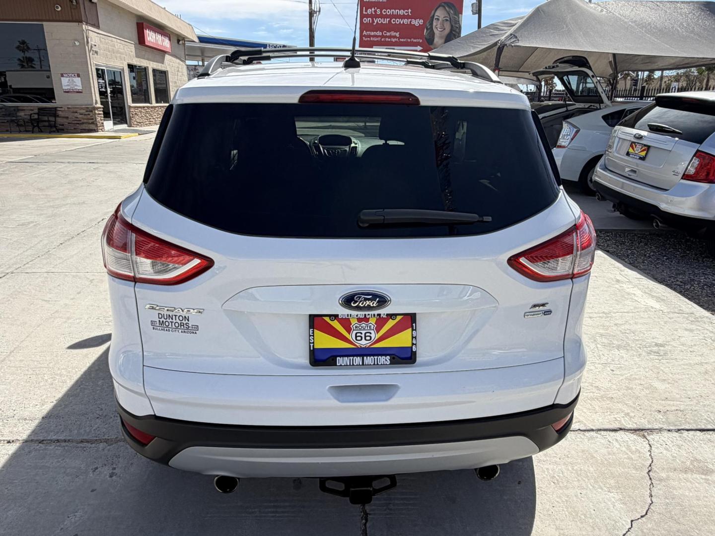 2013 White Ford Escape SE AWD (1FMCU9GX1DU) with an 1.6L L4 DOHC 16V engine, 6-Speed Automatic transmission, located at 2190 Hwy 95, Bullhead City, AZ, 86442, (928) 704-0060, 0.000000, 0.000000 - Photo#2