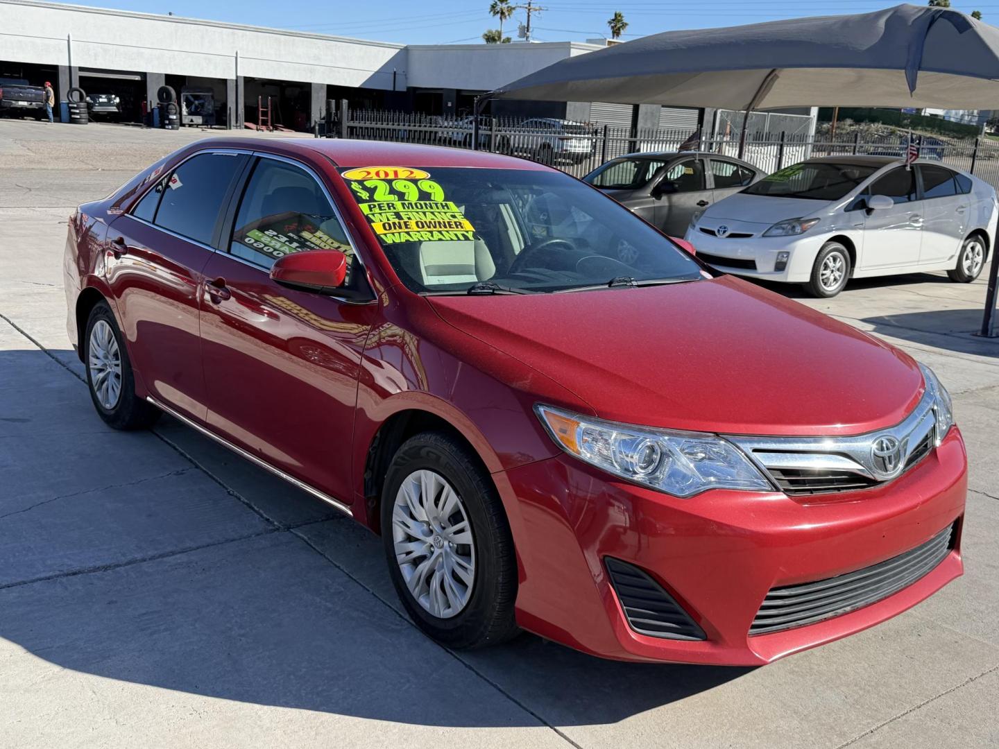 2012 Red Toyota Camry SE (4T4BF1FK7CR) with an 2.5L L4 DOHC 16V engine, 6-Speed Automatic transmission, located at 2190 Hwy 95, Bullhead City, AZ, 86442, (928) 704-0060, 0.000000, 0.000000 - Photo#2