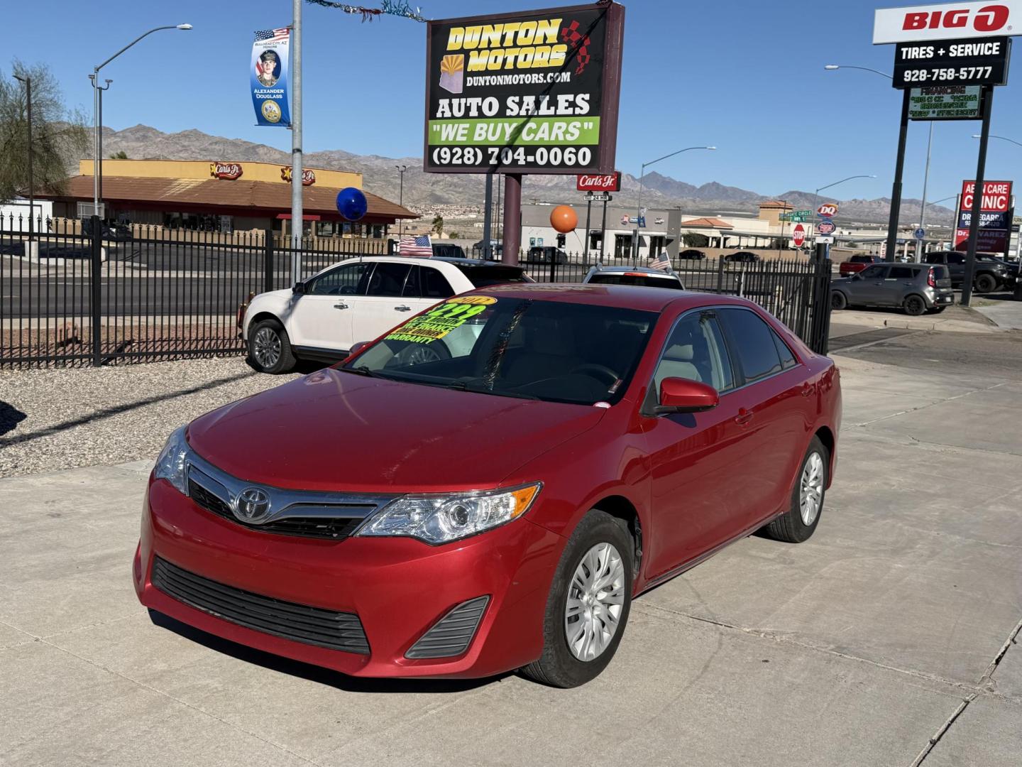 2012 Red Toyota Camry SE (4T4BF1FK7CR) with an 2.5L L4 DOHC 16V engine, 6-Speed Automatic transmission, located at 2190 Hwy 95, Bullhead City, AZ, 86442, (928) 704-0060, 0.000000, 0.000000 - Photo#3
